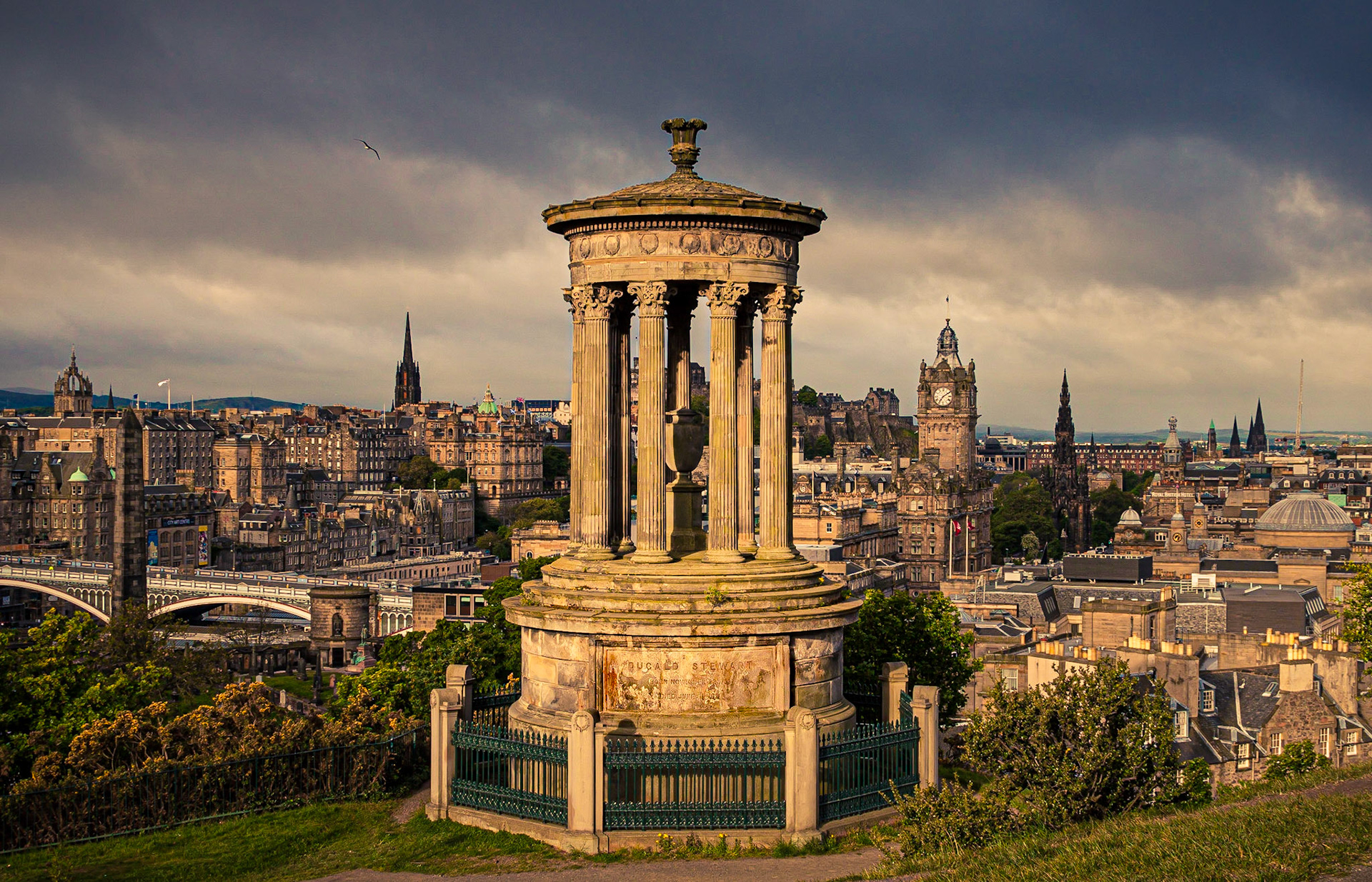 April 9, 2020Sunrise at the Dugald Stewart Monument on Calton Hill in Edinburgh, Scotland. The monument is a memorial to the Scottish philosopher Dugald Stewart (1753–1828) completed in 1831.The photo was taken during a photo trip by car with my good friend Martin Evening. Martin even let me drive...I tended to run up on curbs and had a hard time going through traffic circles. Martin said, "oh my, oh my" a lot. They drive on the wrong side of the road over there!