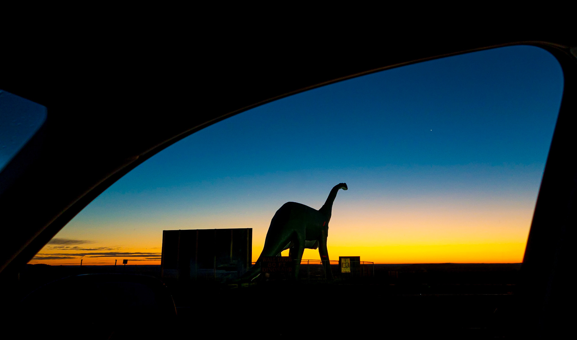 June 11, 2019Sunrise in Wall, South Dakota near the 80 foot Wall Drug Dinosaur.