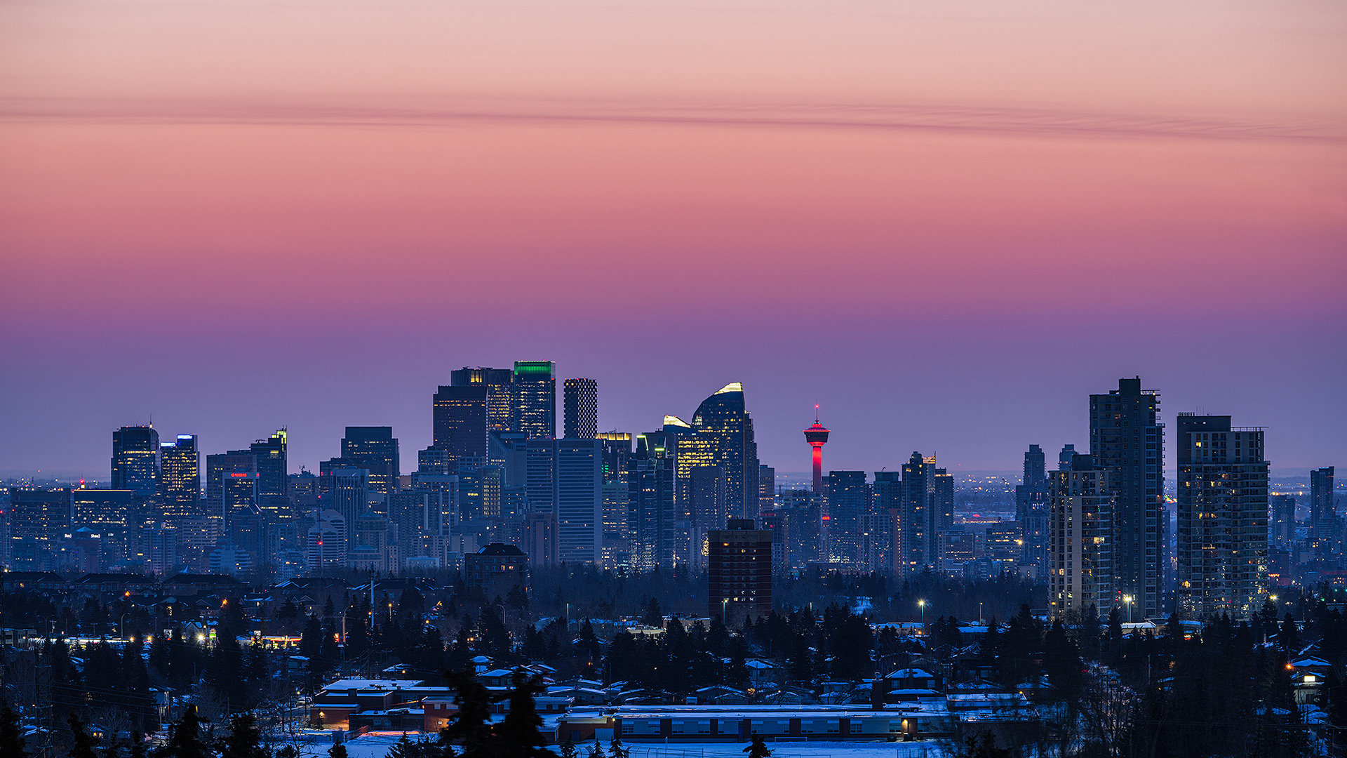 A photo of the Downtown Calgary skyline a half hour before Sunrise, from a park in Strathcona, Calgary, AB - March 18th (7:15 AM, 38 Mp, 16:9 crop)