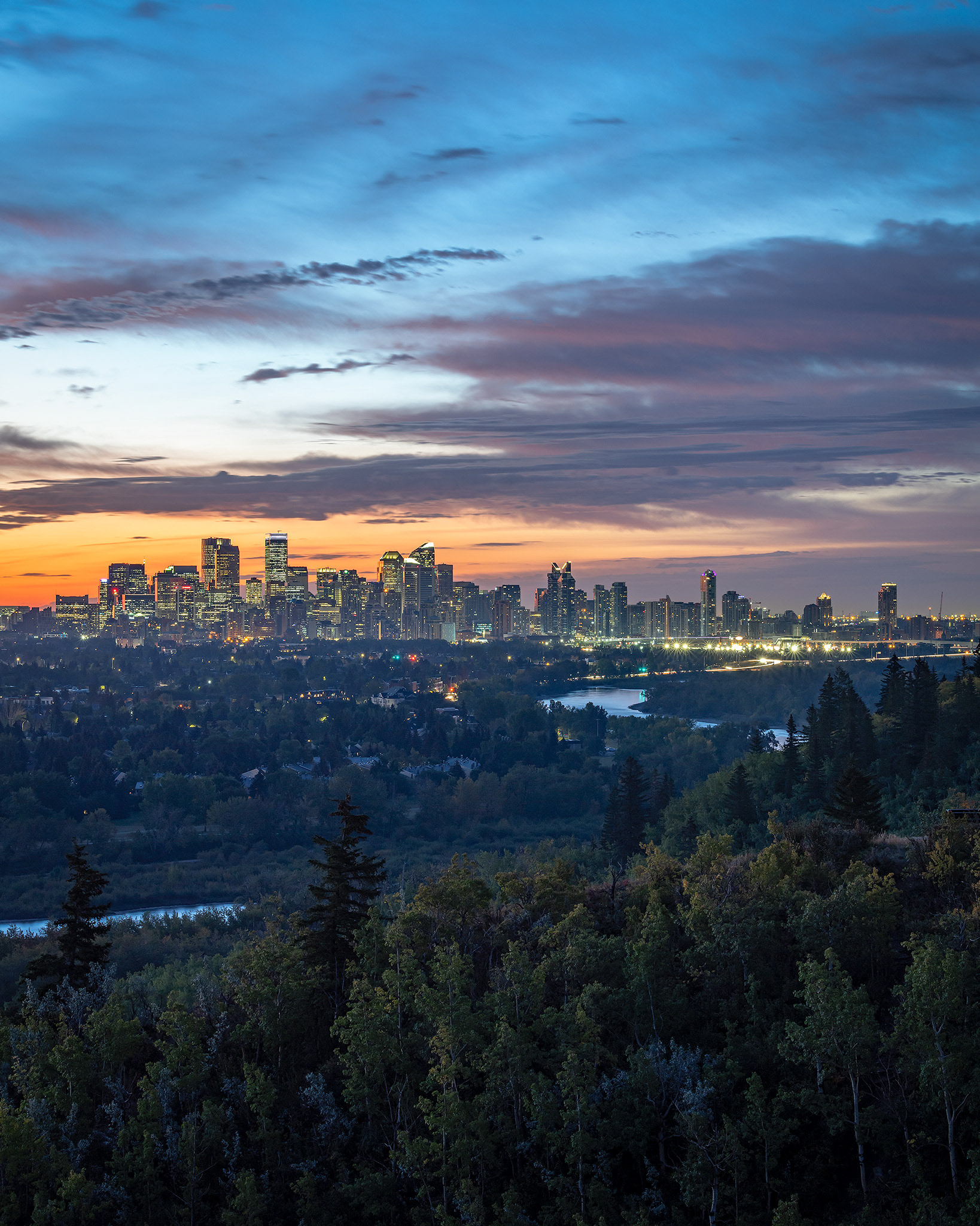 Pre rising Sun behind (and a little to the left) the Downtown Calgary skyline, from Edworthy Park, Calgary, AB - September 22nd (6:39 AM)