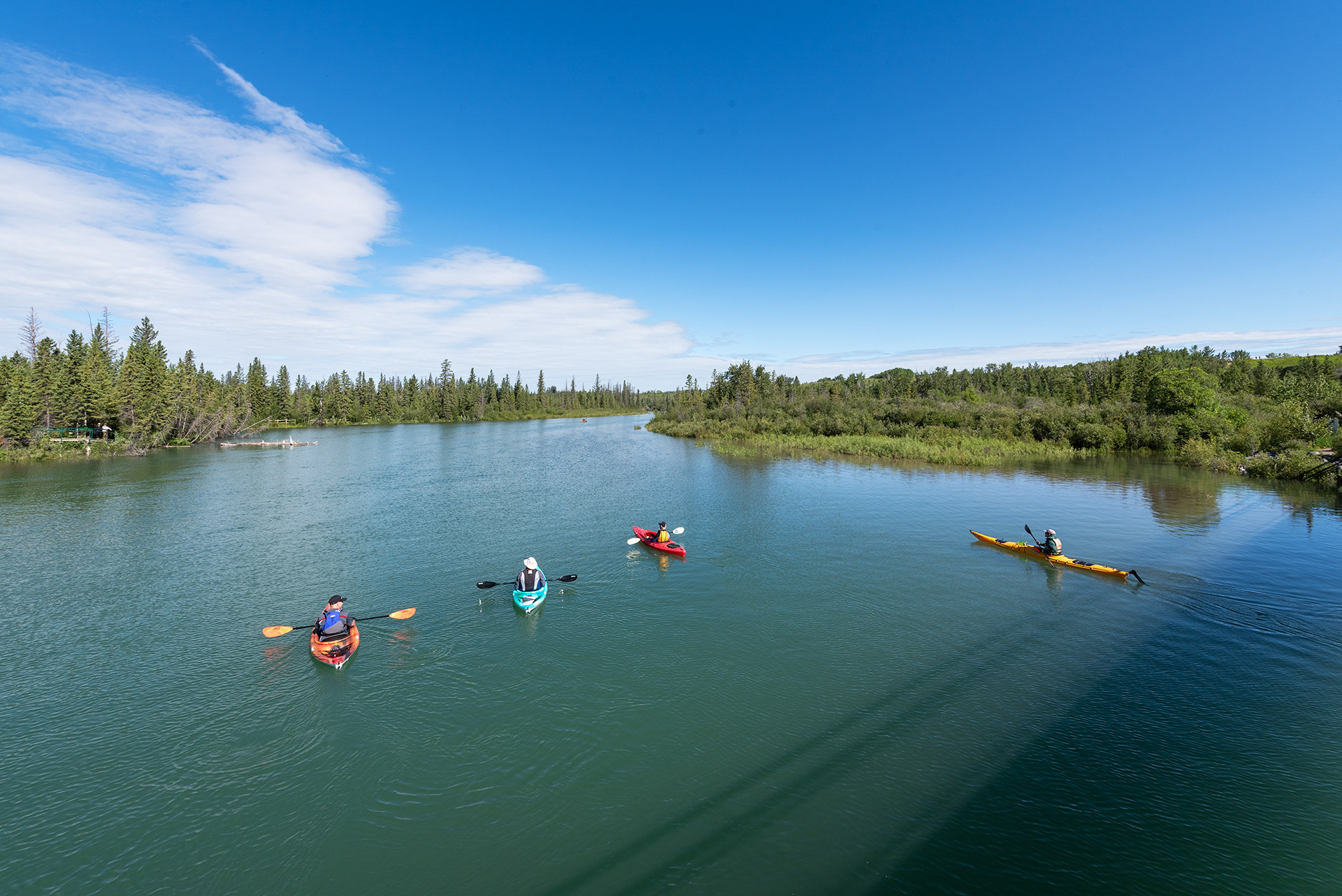 Upstream view of the Elbow River, from a foot bridge, just prior to it entering the delta
