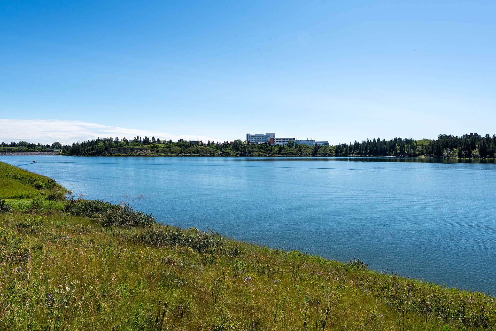 View of the Glenmore Reservoir, and Rockyview General Hospital, alongside Earl Grey Golf Club