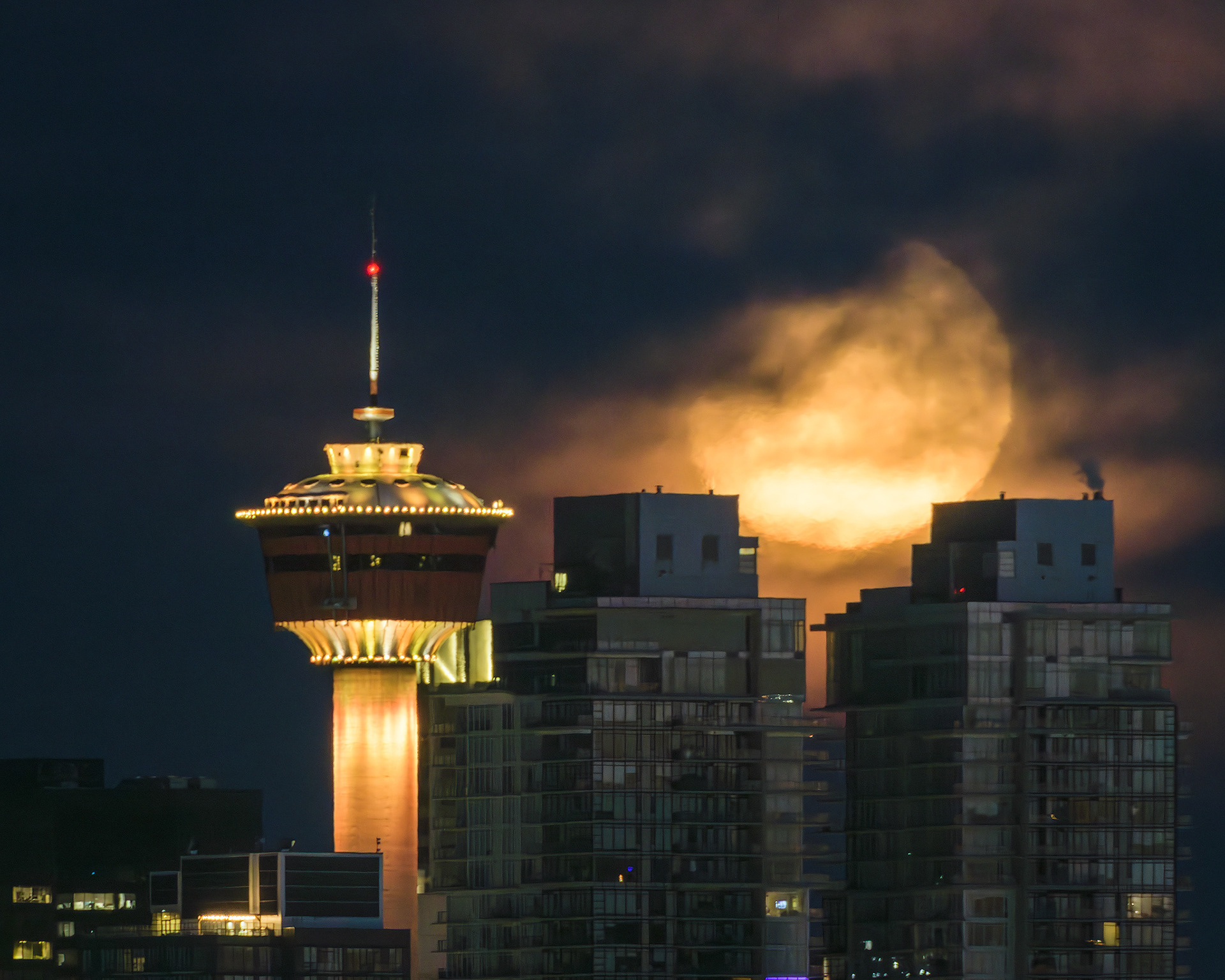 A shot with the Calgary Tower, and the setting Moon aligned between twin buildings, from Southview Off Leash Dog Park, Calgary, AB - March 4th (6:27 AM, 5:4 crop, 35 Mp)