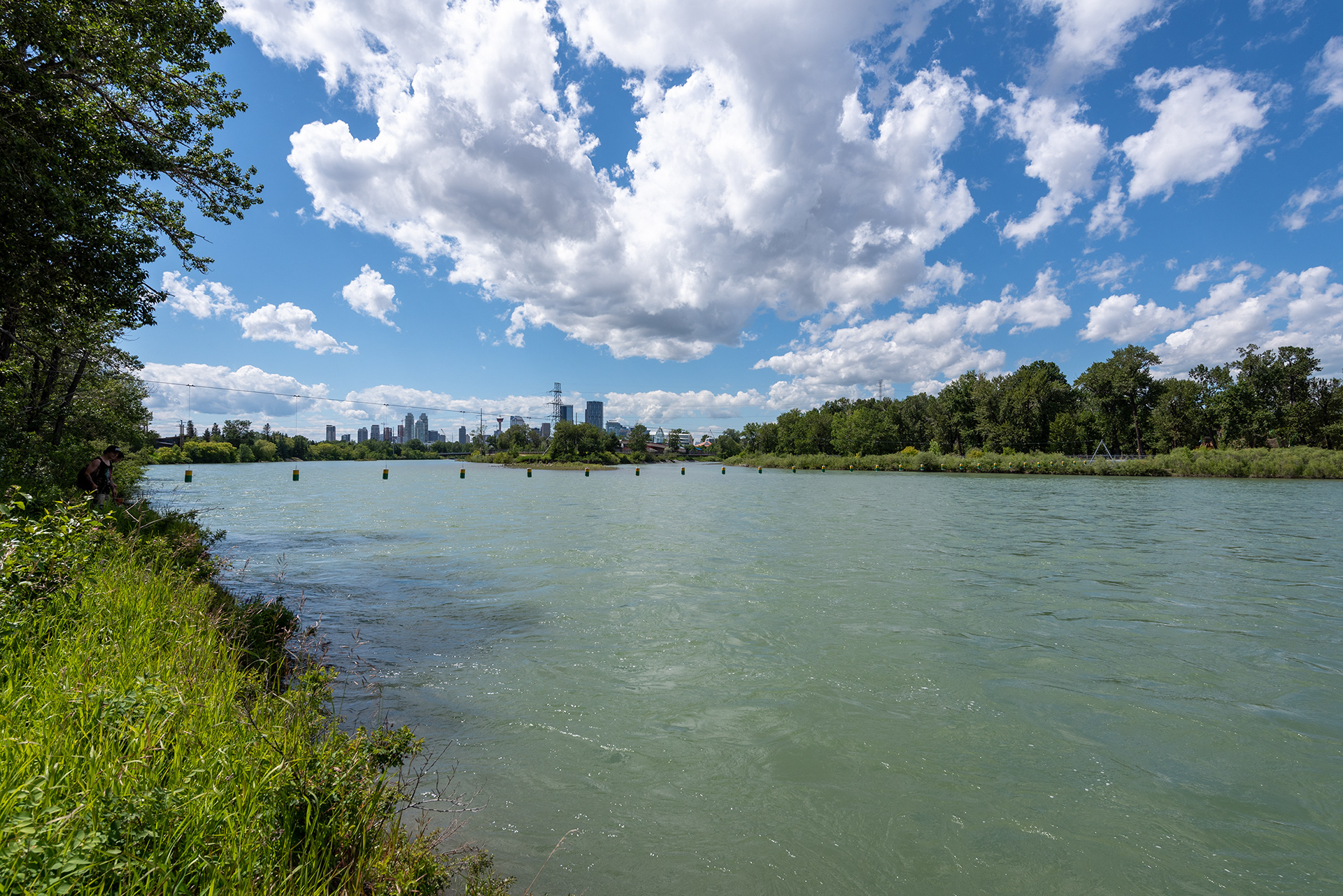 Upstream view of the Bow River from Inglewood River Promenade Park, Calgary, Alberta