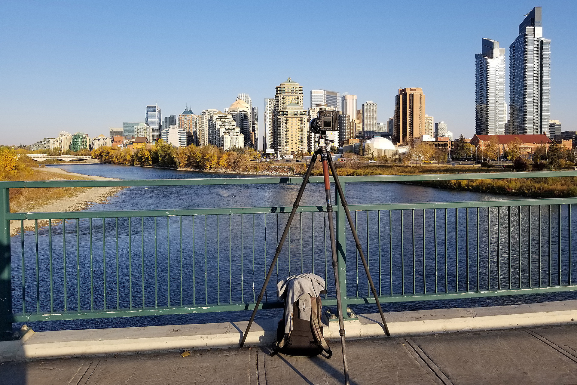 My camera gear set up, pointed at the narrow gap in the middle of the Downtown Calgary core, from the Mewata Bridge, Calgary, AB - October 8th