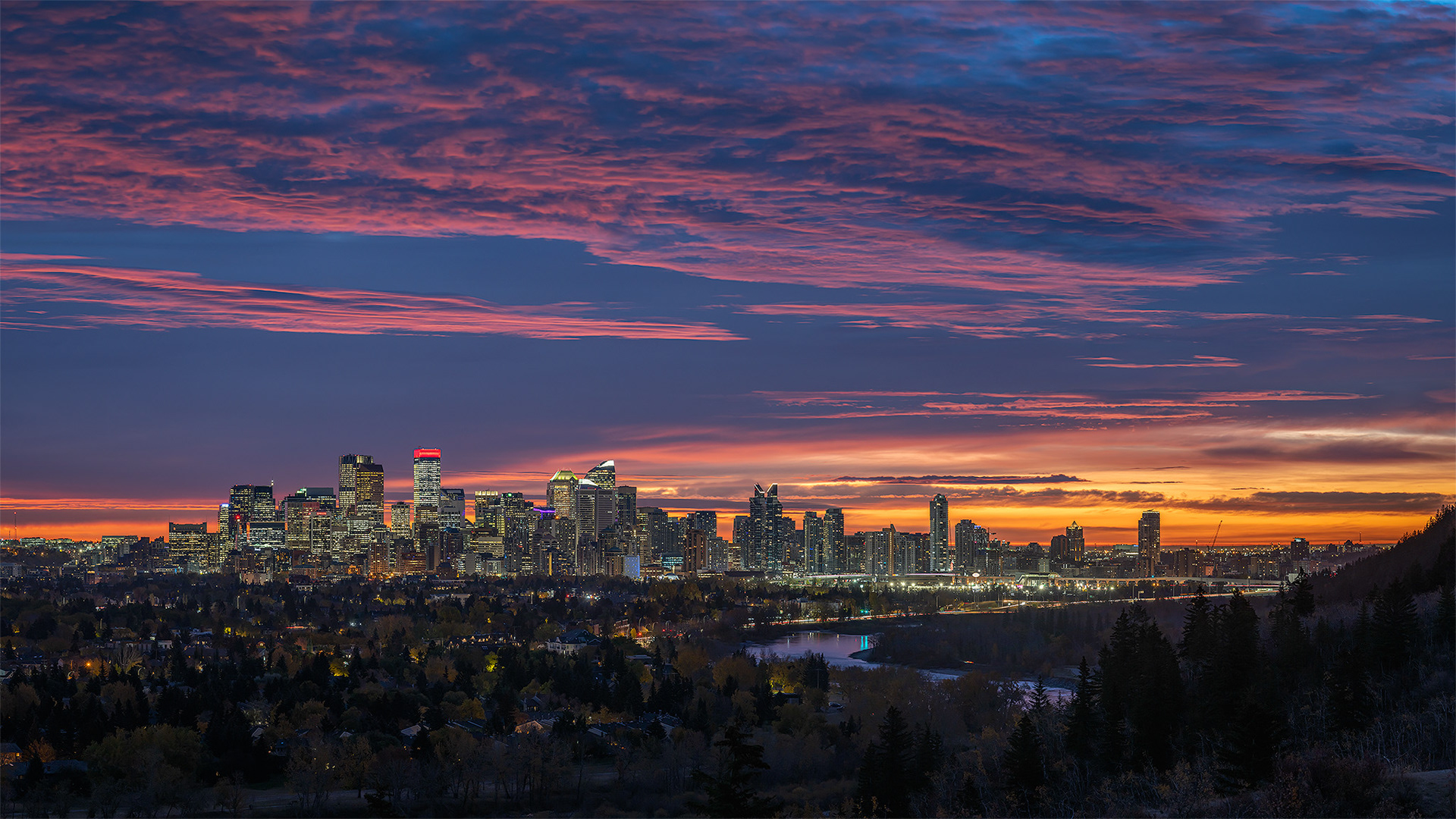 16:9 panoramic (5 shot) image of the Downtown Calgary skyline (43 minutes before Sunrise), from Edworthy Park, Calgary, AB - October 14th (7:16 AM, 98 Mp)