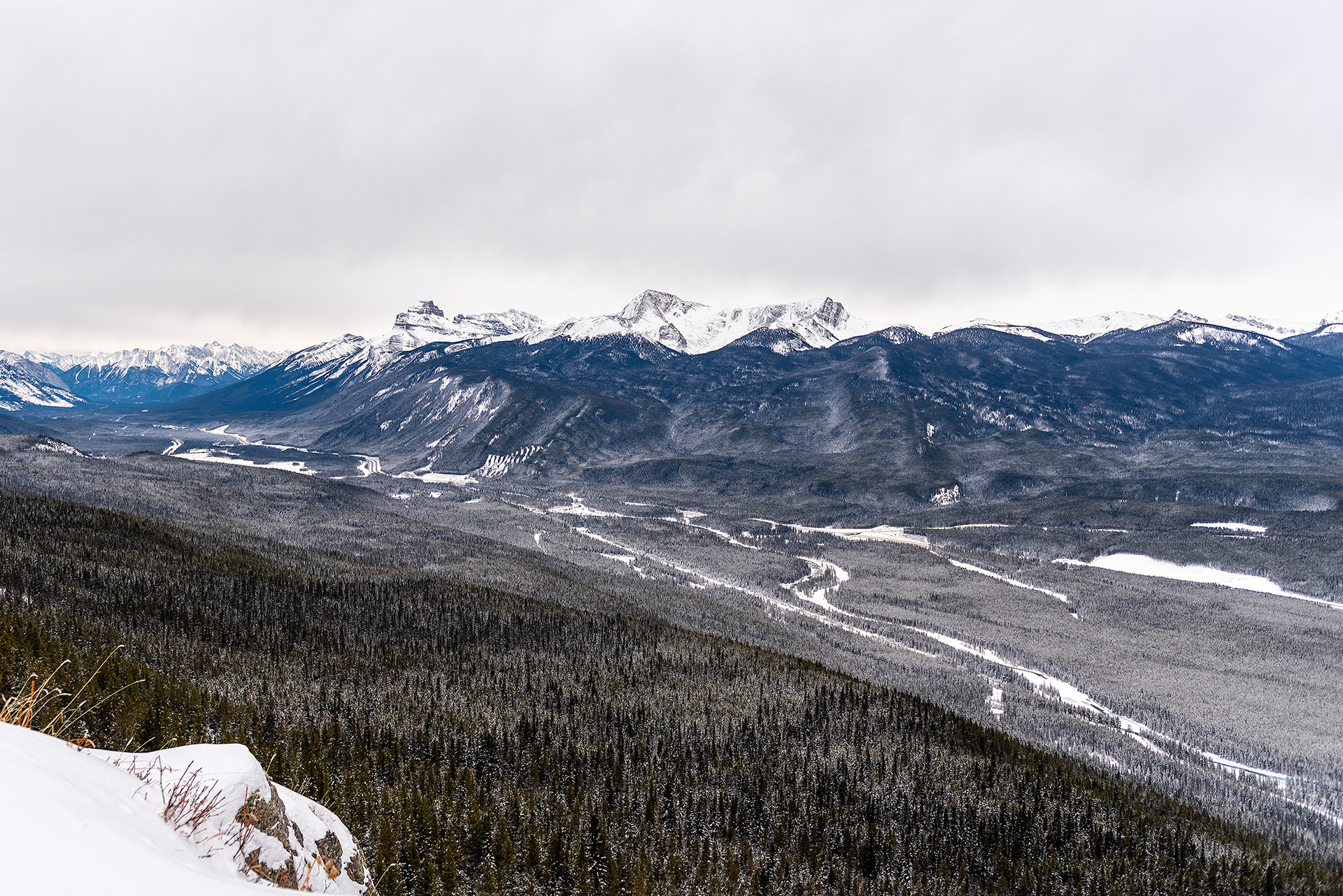 A view of the Bow Valley (Bow River, Castle Junction, Bow Valley Pkwy, Banff-Windermere Hwy, and Trans-Canada Hwy all shown) from the Castle Lookout hiking trail in Banff National Park, AB