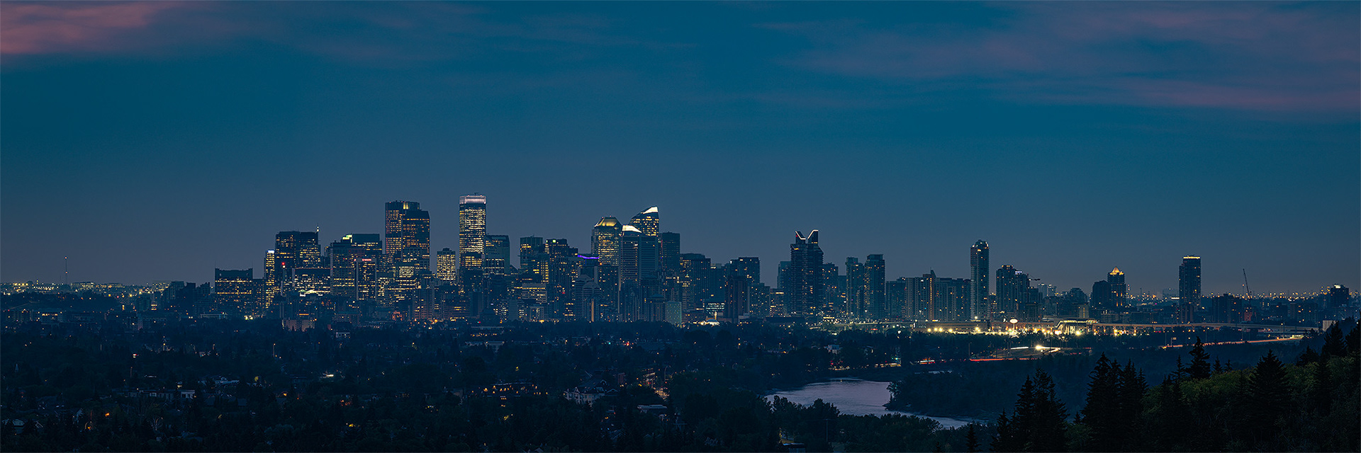 3x1 Panoramic Cityscape of the Downtown Calgary skyline at Sunrise, from Edworthy Park, Calgary, AB