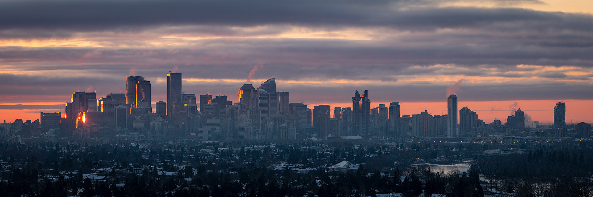 3x1 Panoramic Cityscape (8 shot) of the downtown skyline, with Bow River [pre sunrise, Civil Twilight (sun altitude -0.2 degrees)], from Edworthy Park, Calgary, AB