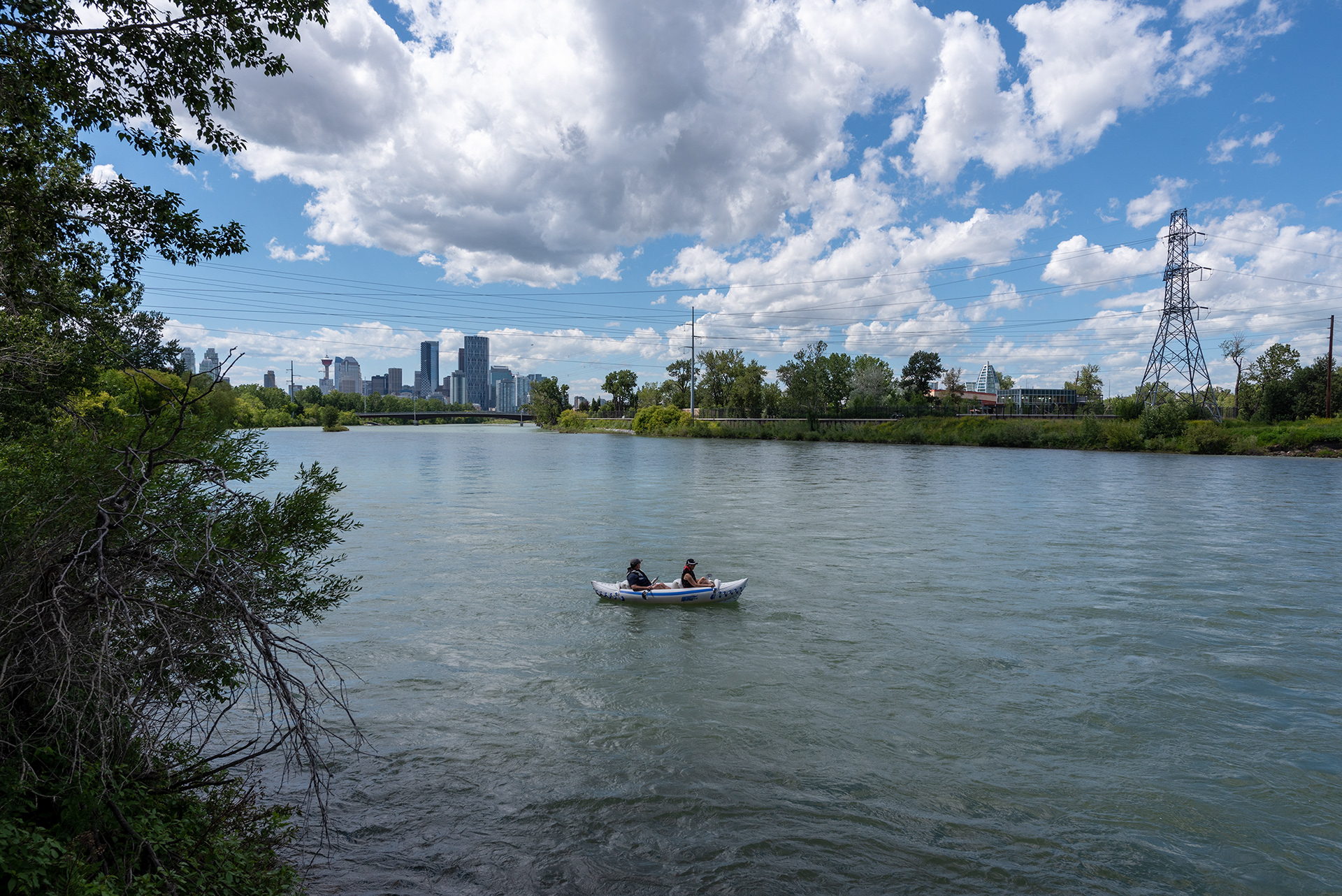 Upstream view of the Bow River from a little way past the 12 Street SE bridge, Calgary, Alberta