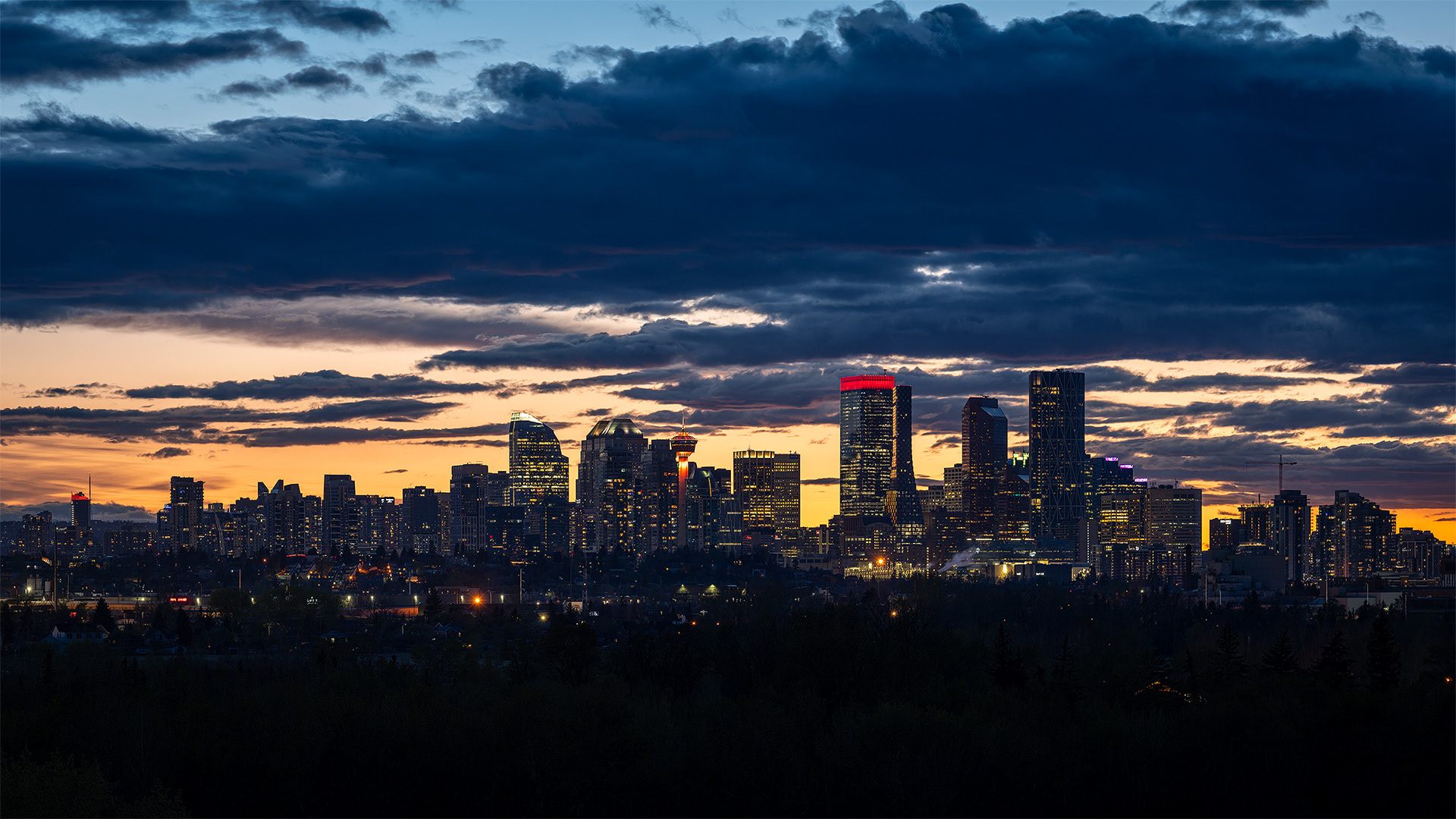 16x9 Panoramic Cityscape (5 shot) of the downtown skyline [Nautical Twilight (sun altitude -6.4 degree)] from near Valleyview Park, Calgary, AB