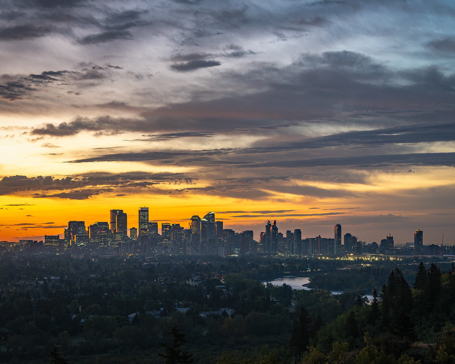 Pre rising Sun behind (and a little to the left) the Downtown Calgary skyline, from Edworthy Park, Calgary, AB - September 22nd (6:52 AM)