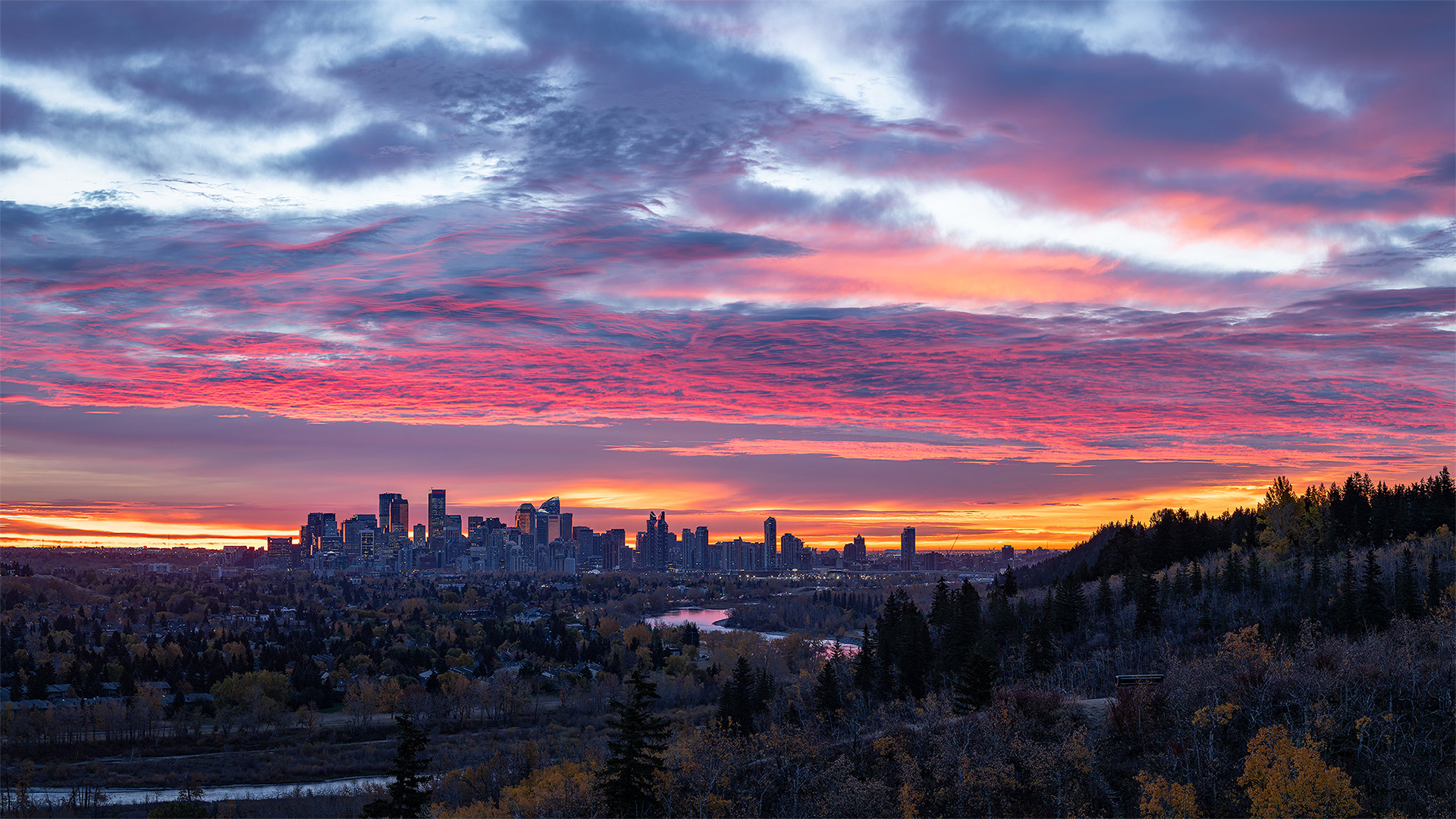 16:9 panoramic (5 shot) image of the Downtown Calgary skyline (15 minutes before Sunrise), from Edworthy Park, Calgary, AB - October 14th (7:44 AM, 87 Mp)
