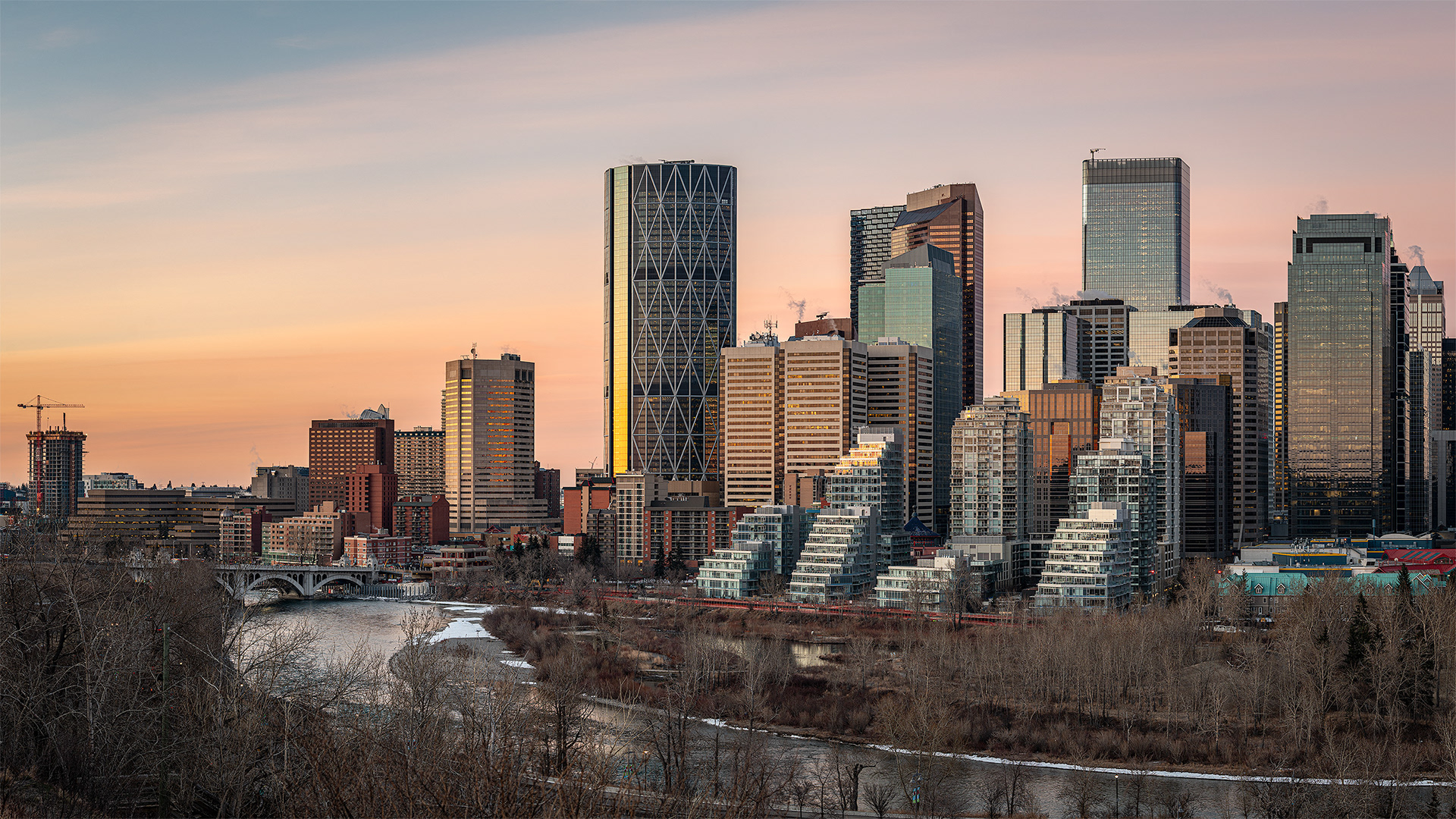 16x9 Cityscape (5 shot) of the Centre St. Bridge, Bow River, and a portion of the downtown skyline, from Crescent Heights Lookout Point, Calgary, AB