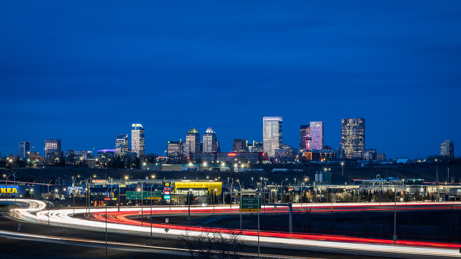 Late daily commute (with a portion of the downtown skyline) from near Southland Drive and Blackfoot Trail, Calgary, AB