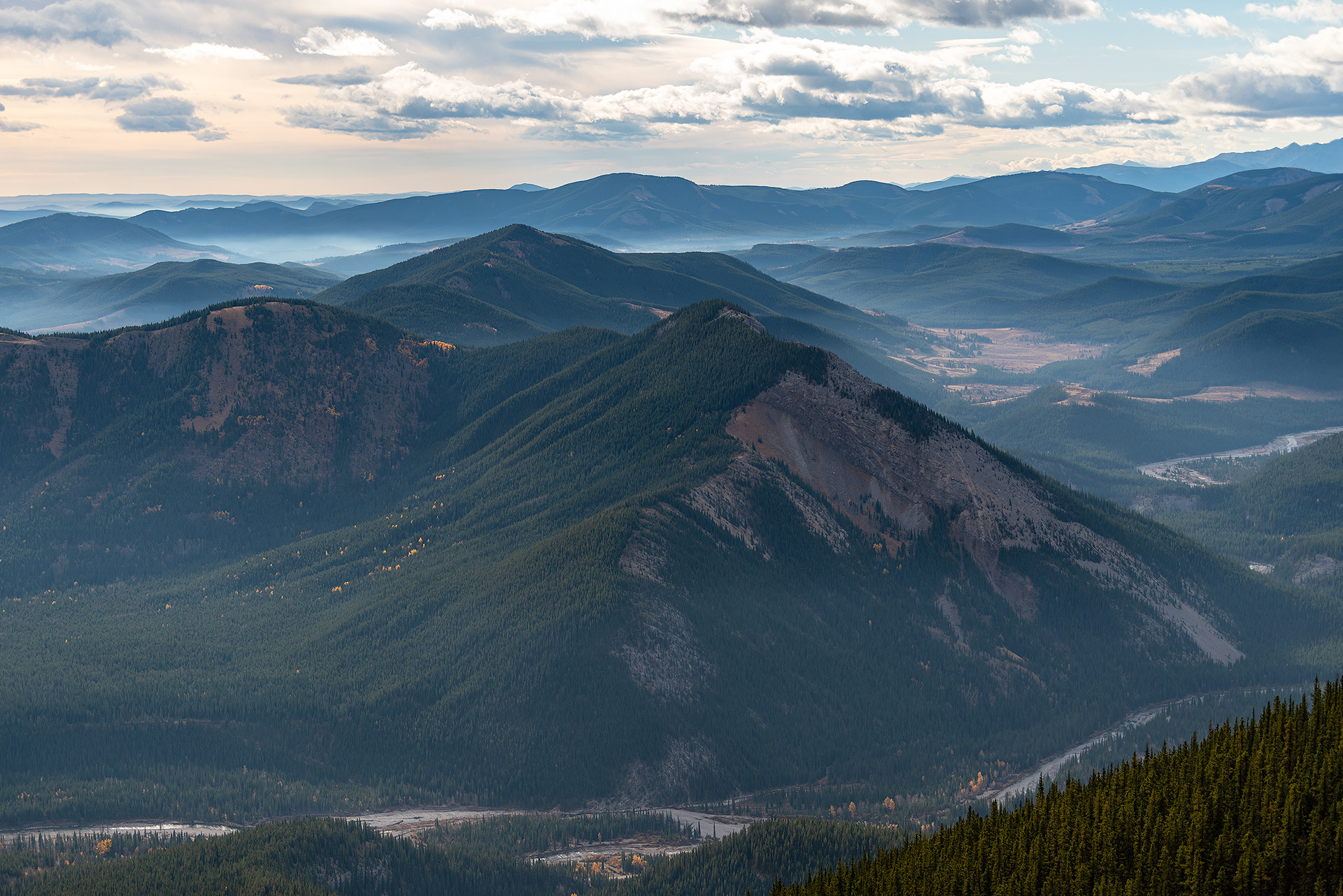 A view of the Elbow River (near Elbow Falls), and foothills with some valley fog, from Prairie Mountain, Alberta