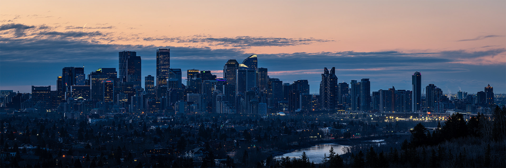 3x1 Panoramic Cityscape (9 shot) of the downtown skyline [pre sunrise, Civil Twilight (sun altitude -4.3 degrees)], from Edworthy Park, Calgary, AB