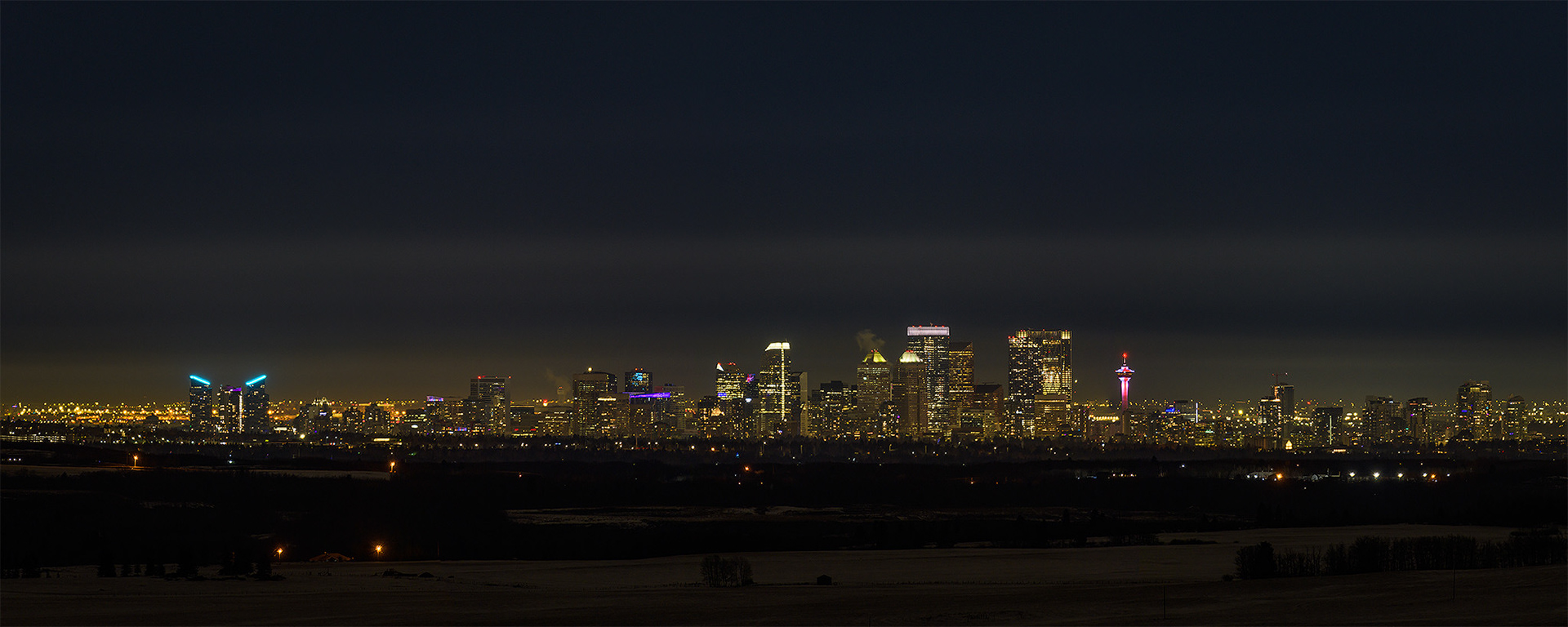 5:2 panoramic (6 shot) image of the Downtown Calgary skyline (at Night), from Foothills County, AB - January 14th (10:08 PM, 129 Mp)