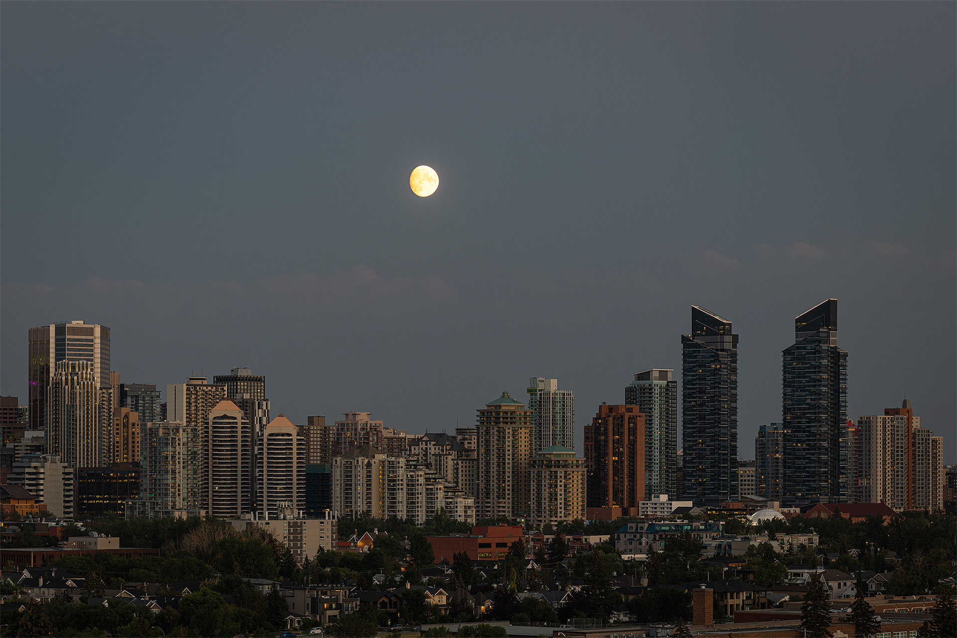 3x2 Cityscape of the Downtown Calgary skyline at Sunset/Moonrise, from West Hillhurst off-leash area (Grasshopper Hill), Calgary, AB