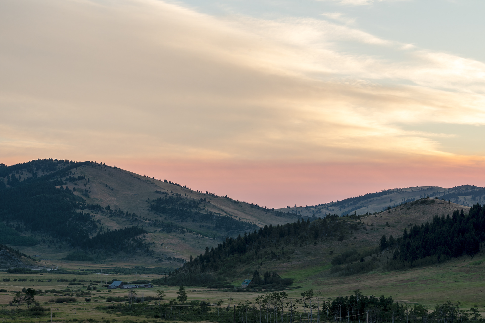 a tinge of orange is visible on the horizon in the early morning light
