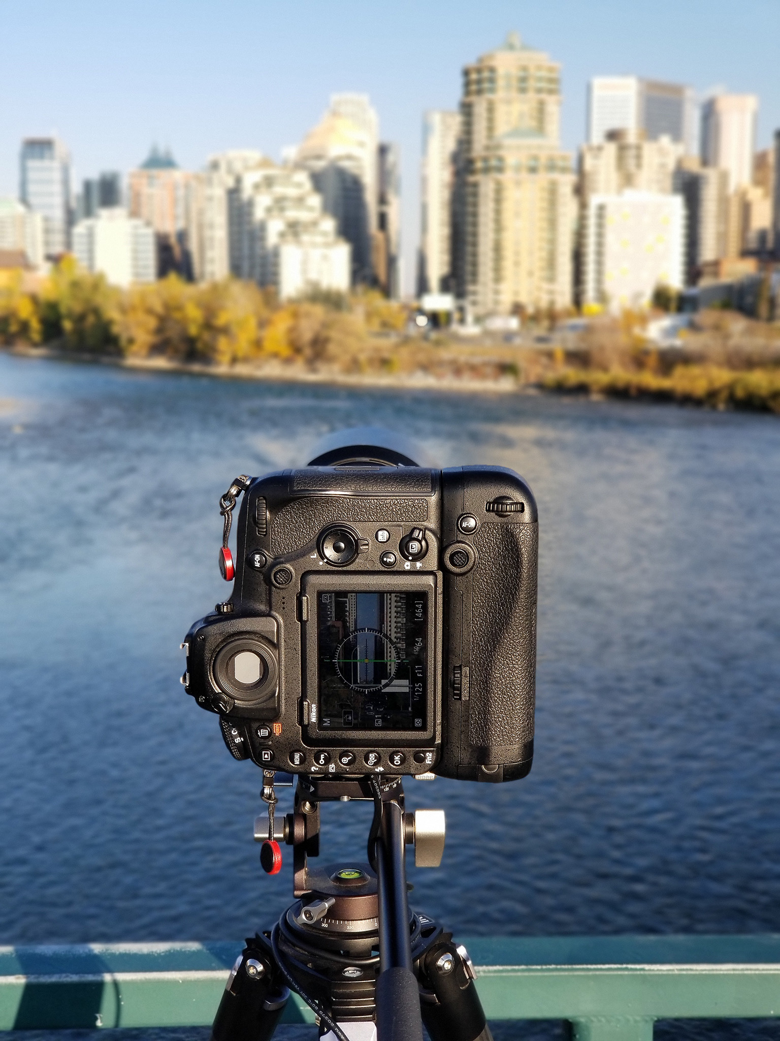 My camera gear set up, pointed at the narrow gap in the middle of the Downtown Calgary core, from the Mewata Bridge, Calgary, AB - October 8th