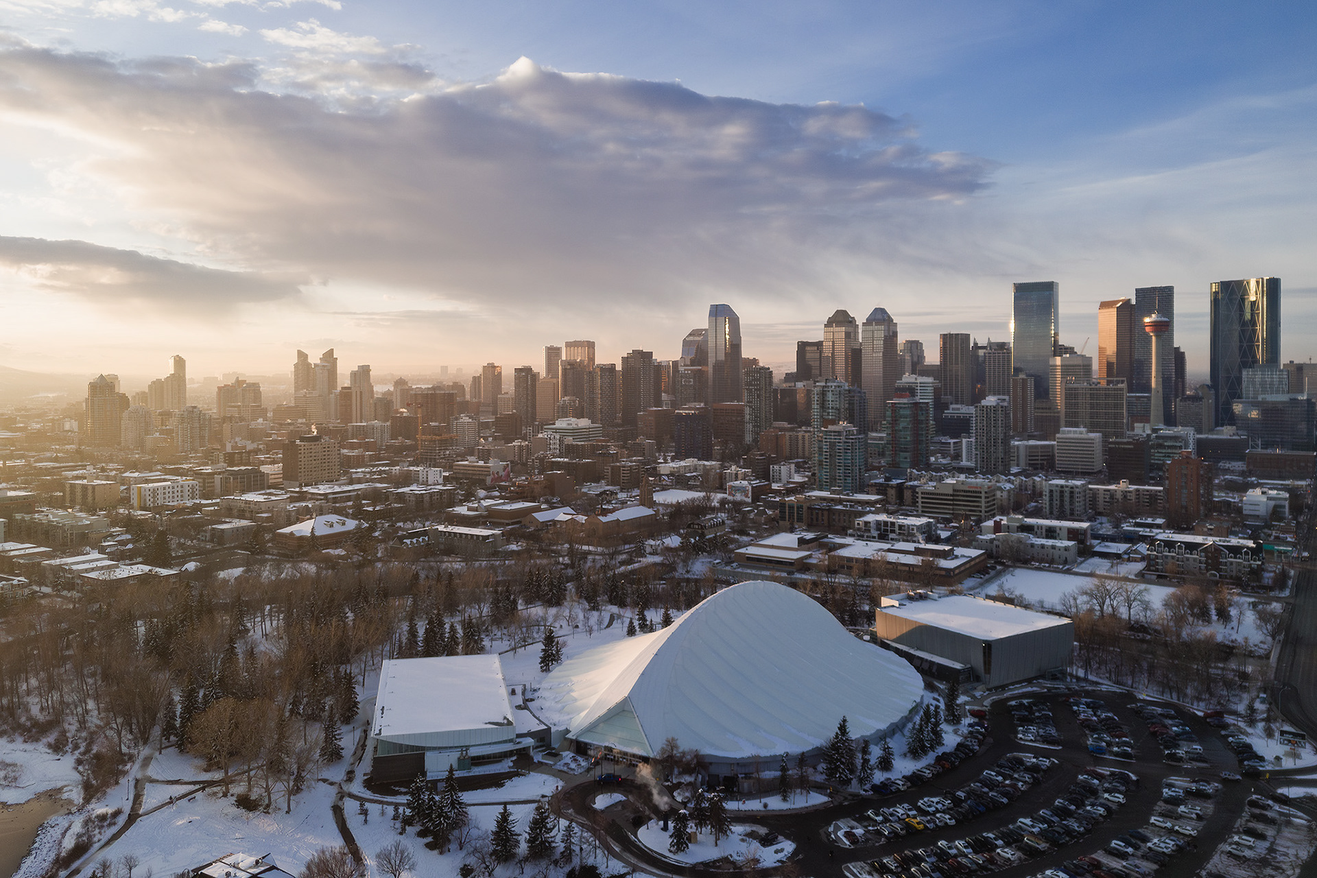 A photo of the MNP Community & Sport Centre, with the Downtown Calgary skyline in the background, from near Roxboro, Calgary, AB - March 26th