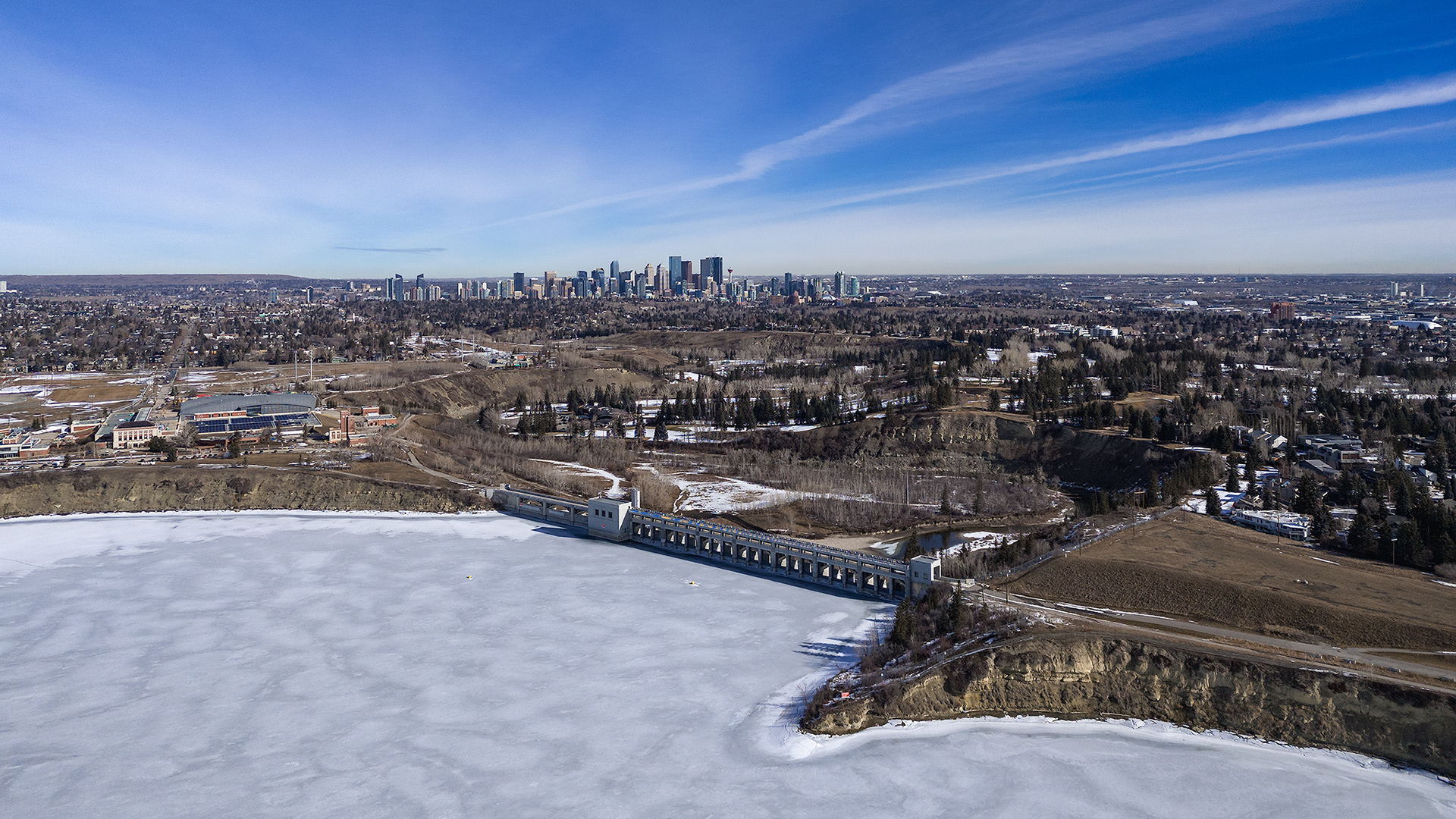 A photo of the Glenmore Dam, with the Downtown Calgary skyline in the background, Glenmore, Calgary, AB - March 14th