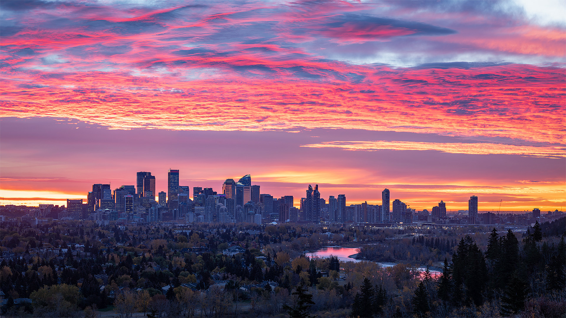 16:9 panoramic (5 shot) image of the Downtown Calgary skyline (14 minutes before Sunrise), from Edworthy Park, Calgary, AB - October 14th (7:45 AM, 126 Mp)
