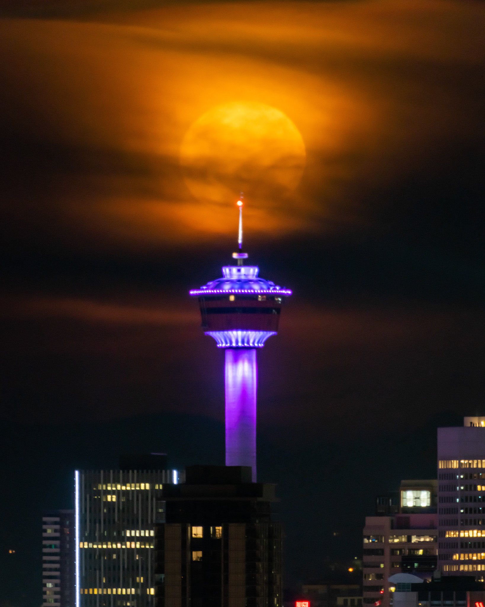 The Calgary Tower and setting Moon, from Tom Campbell's Hill Natural Park, Calgary, AB - October 8th (5:44 AM, 36 Mp)