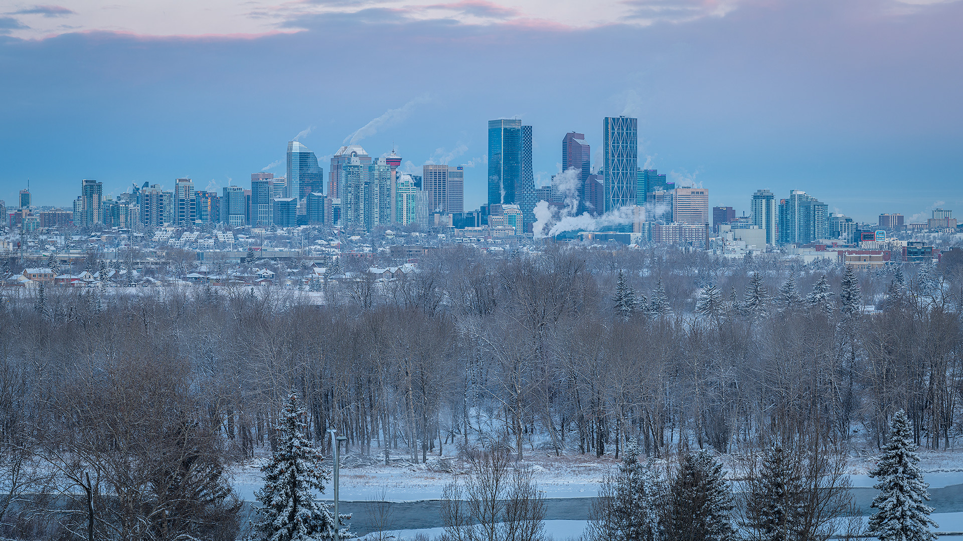 16x9 Panoramic Cityscape (5 shot) of the downtown skyline and the Bow River from near Valleyview Park, Calgary, AB