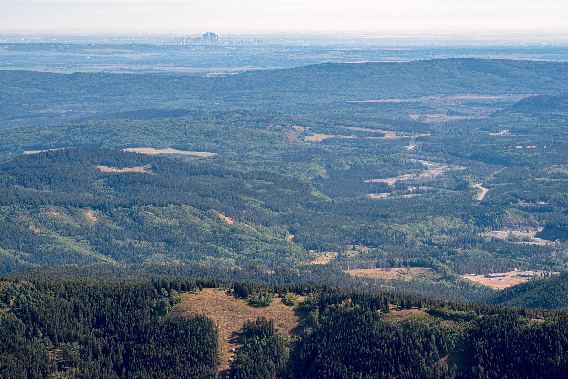 A (200 mm) view from Prairie Mountain (Downtown Calgary visible on the horizon)