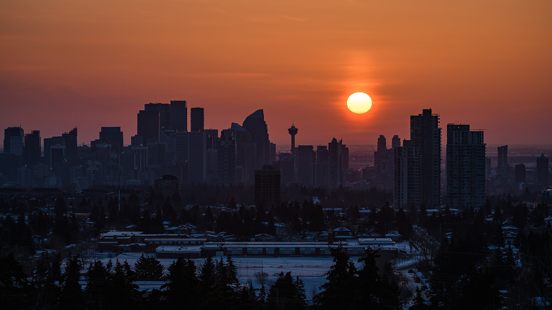 A photo of the Downtown Calgary skyline at Sunrise, from a park in Strathcona, Calgary, AB - March 19th (7:47 AM, 36 Mp, 16:9 crop)