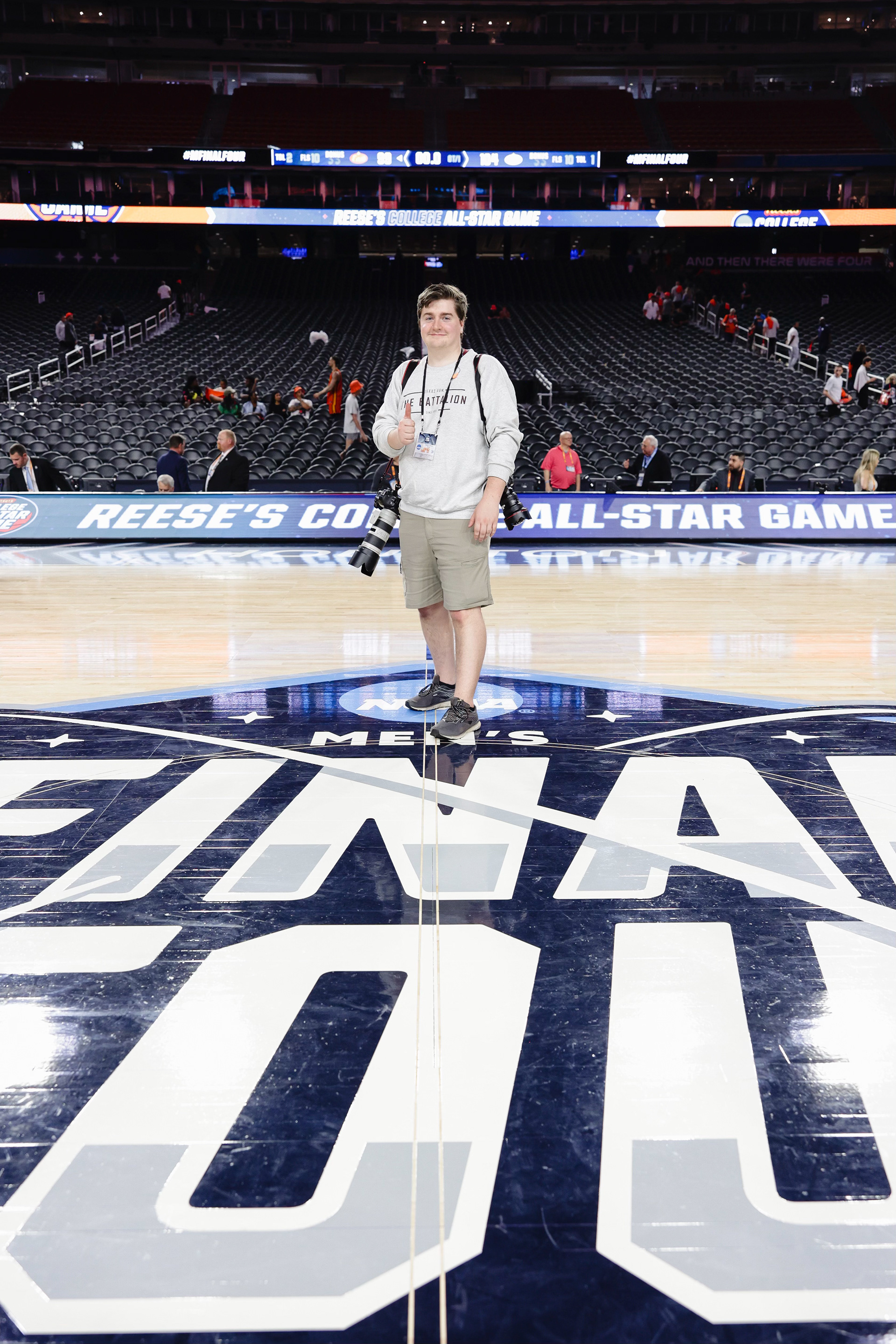 Me on the court at the 2024 Men's Final Four as part of the NCAA Photos Workshop.