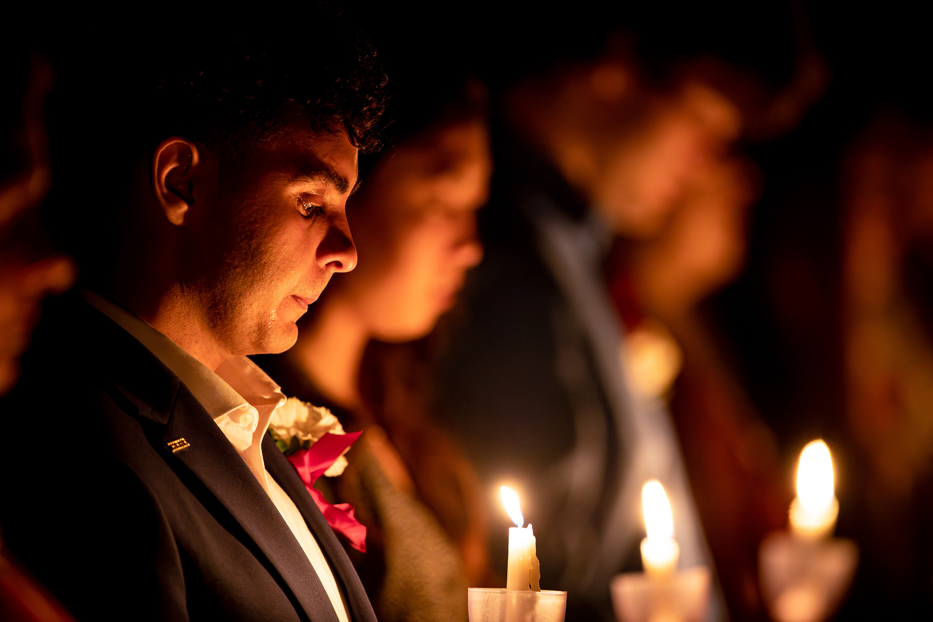 A candleholder sheds a tear at Muster in Reed Arena on Friday, April 21, 2023.