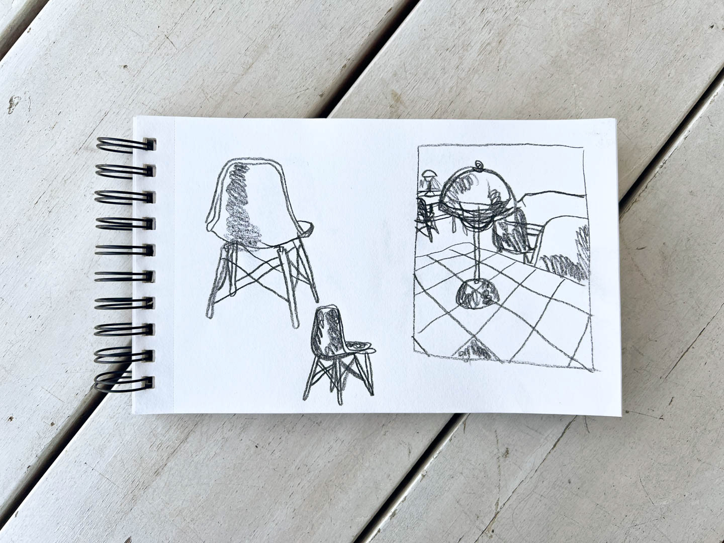 hand-drawn sketches of vitra dsw chair, flower pot lamp and café interior. By Bianca Gschlecht