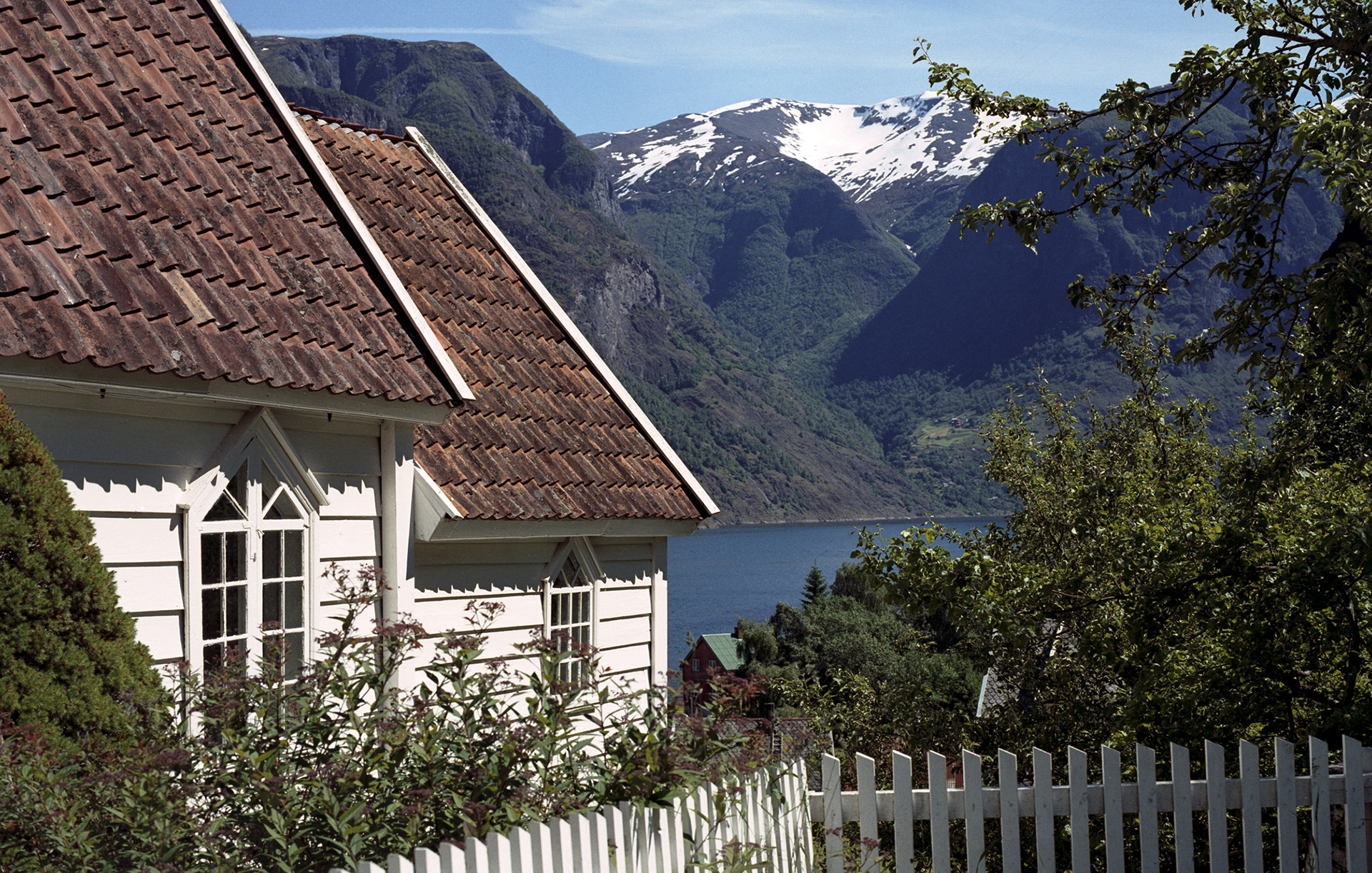 MARIANNE RAFTER IS A FASHION, PORTRAIT AND LIFESTYLE PHOTOGRAPHER BASED IN NEW YORK norwegian fjords mountains undredal stavkirke