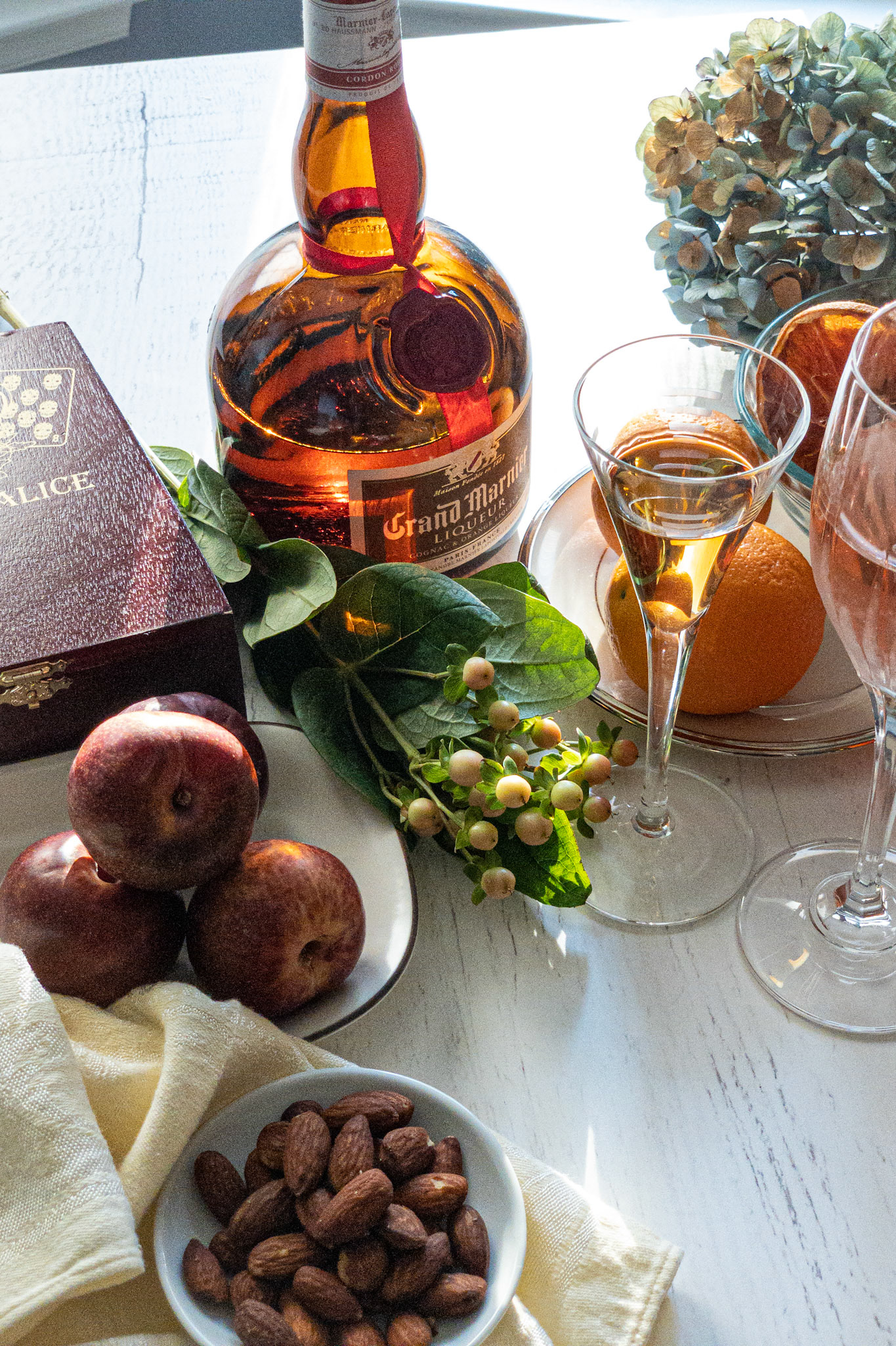 portfolio of food photographer Culinart Photography by Carmen DMV MD grand marnier bottle and glass also flowers and nuts