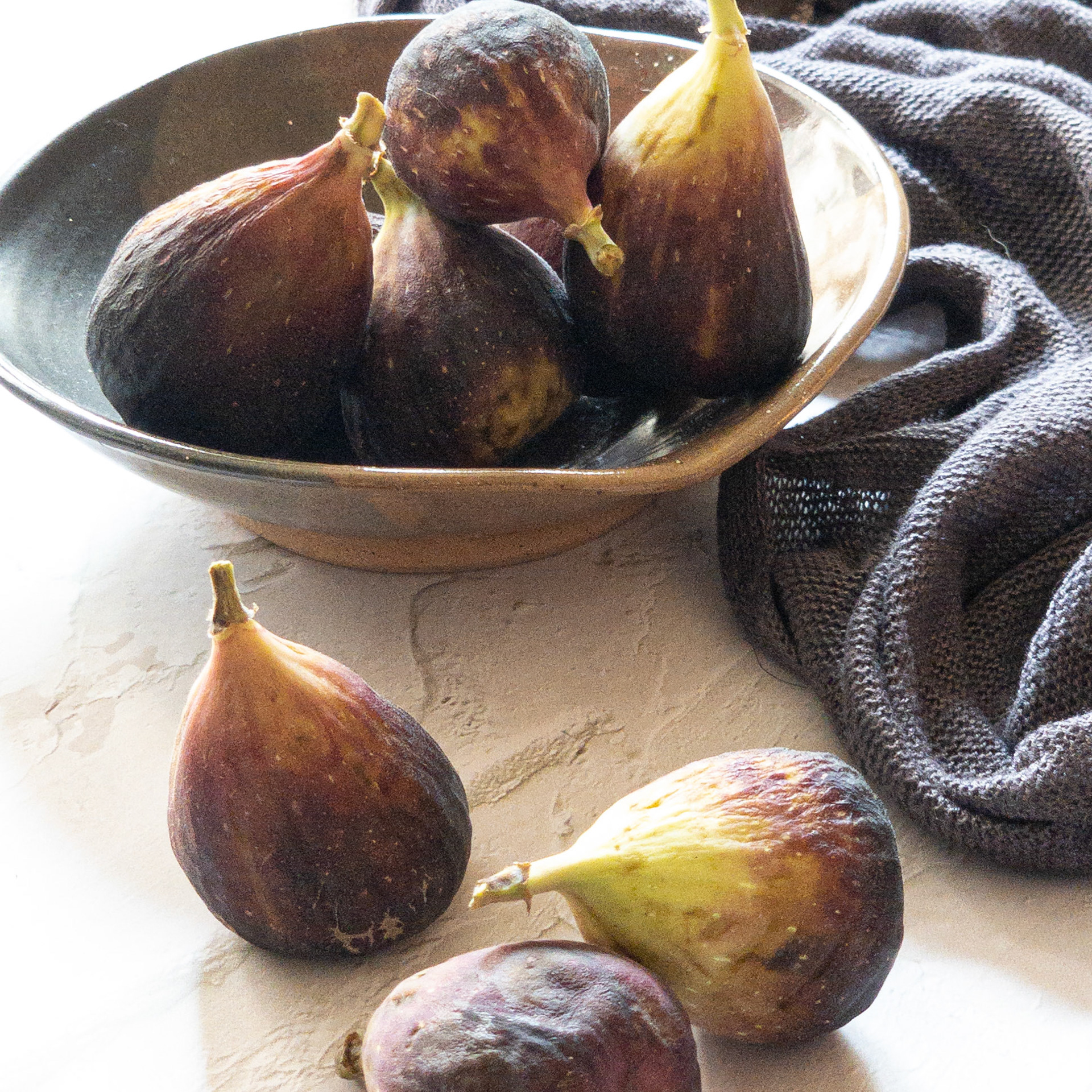 portfolio of food photographer Culinart Photography by Carmen DMV MD figs in handmade bowl on fabric