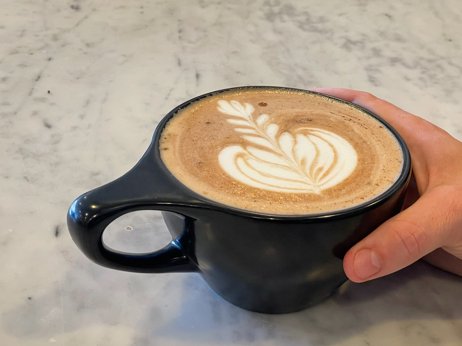 portfolio of food photographer Culinart Photography by Carmen DMV MD design latte in black cup with hands