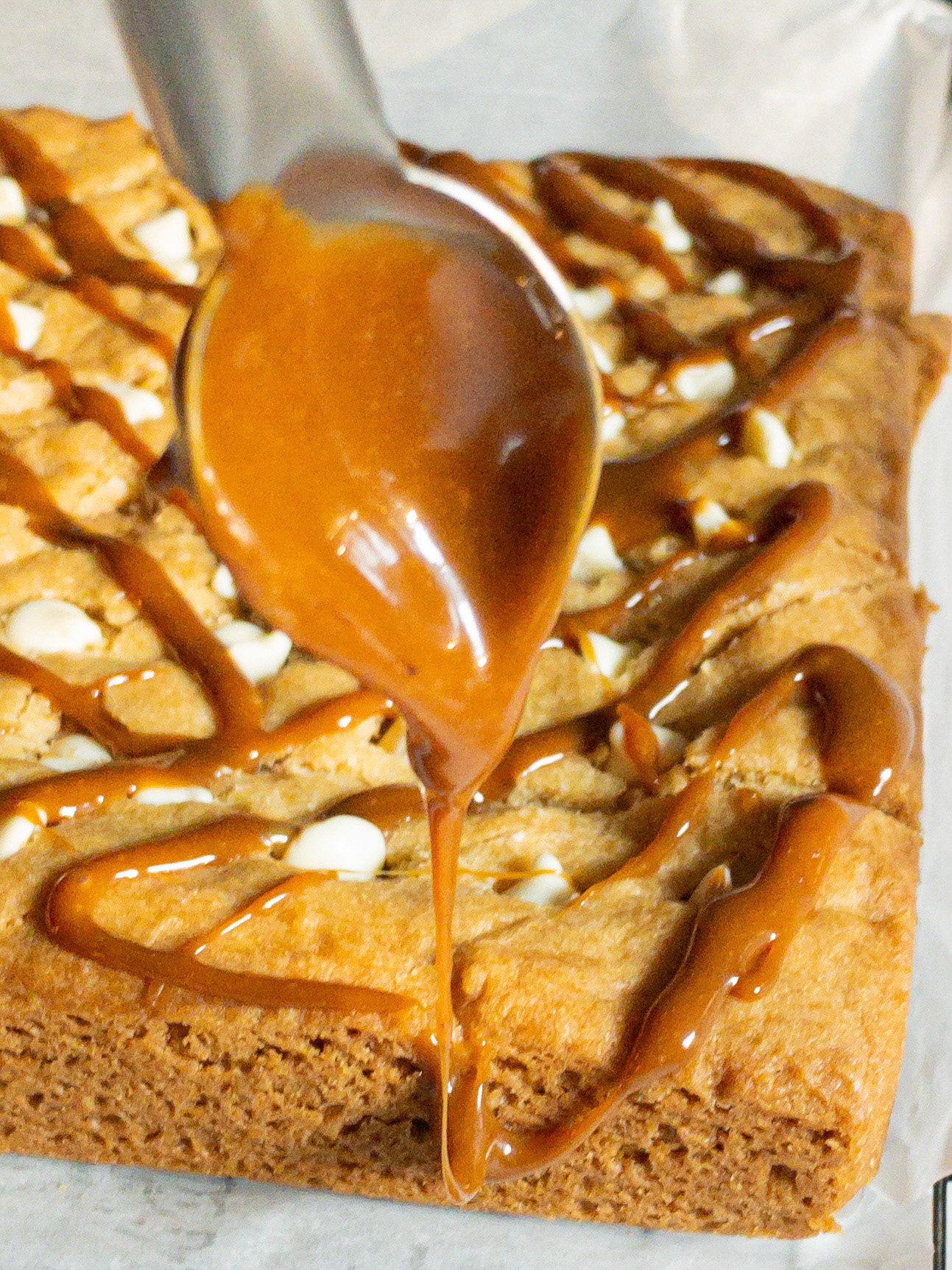 portfolio of food photographer Culinart Photography by Carmen DMV MD carmel dripping onto blonde bar