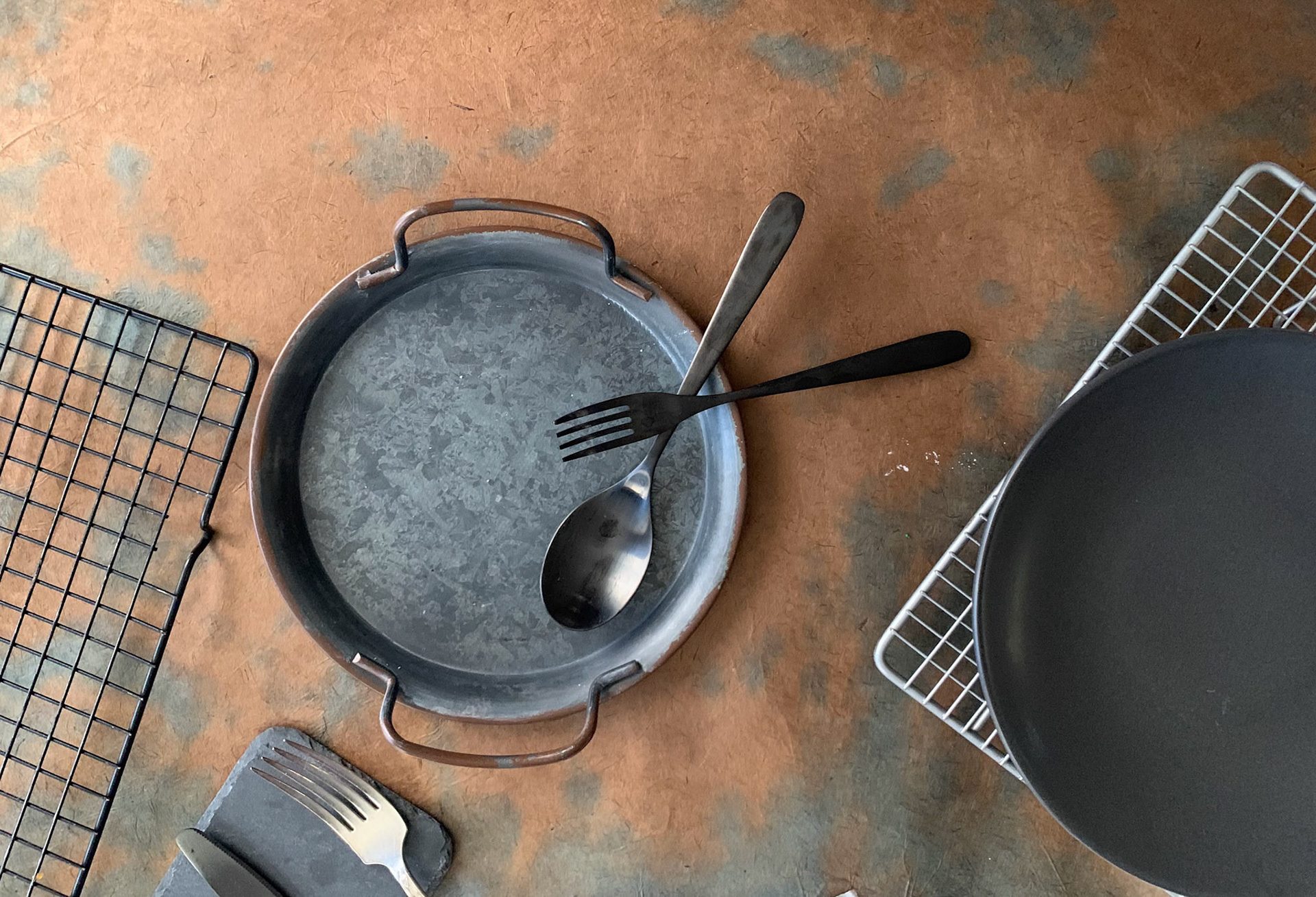 portfolio of food photographer Culinart Photography by Carmen DMV MD baking tin styled with baking rack fork and spoon grey and brown tones