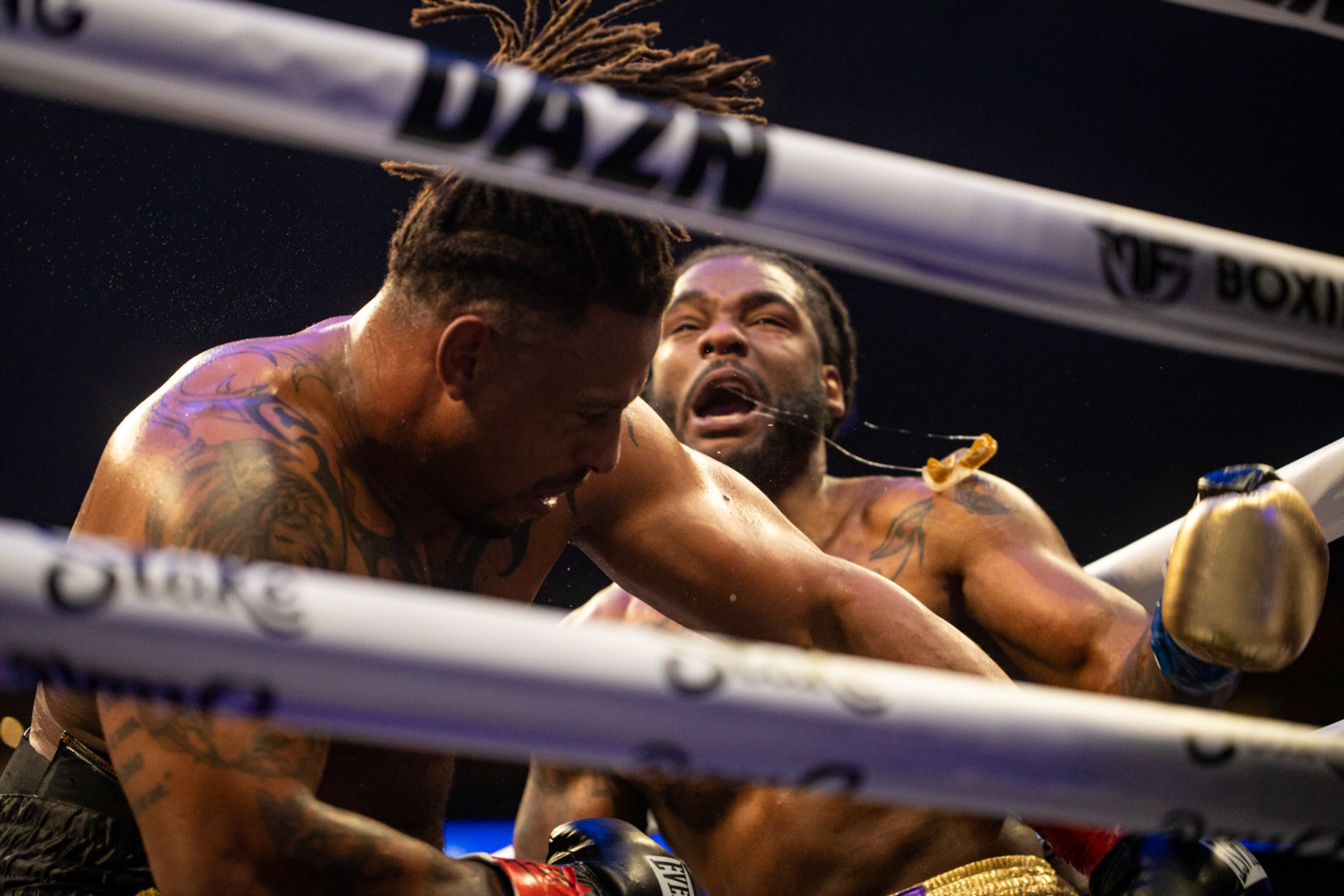 Greg Hardy lands a KO punch on Hasim Rahman Jr. during a boxing match at the Moody Center in Austin, Texas, on Nov. 19. The win marks Hardy's first boxing win afterbeing ousted from the Ultimate Fighting Championship last March.