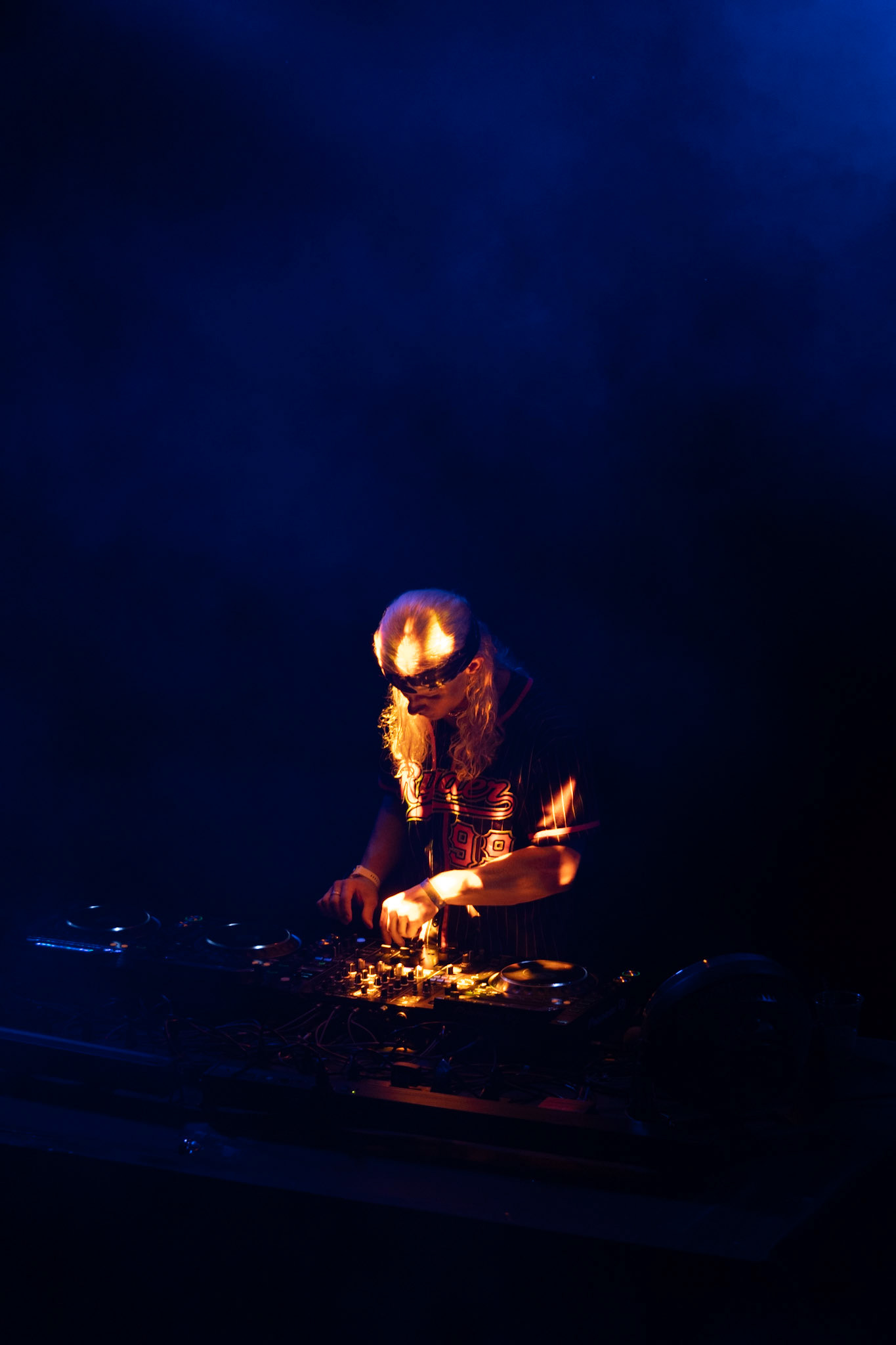 Nolan Simmons performs at The Venue in Austin, Texas on July 9th, 2022. Simmons, a college student, makes money DJing to pay for tuition.