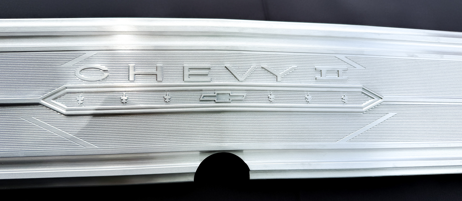 Center section of 1966 Nova SS trunk emblem molding CNC machined from aluminum