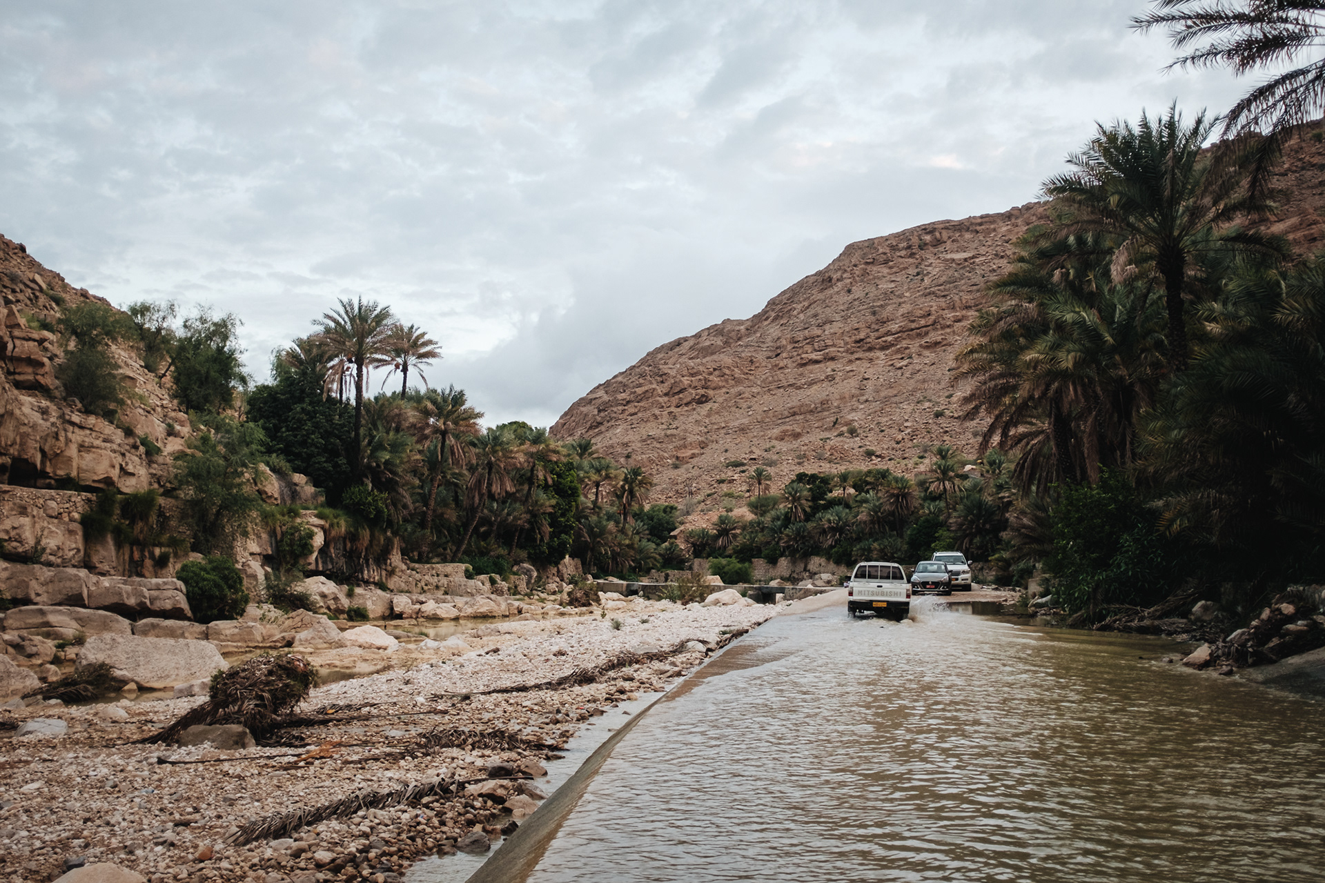 Wadi Bani Khalid is the perfect stop when driving from Nizwa to the desert landscape of Wahiba Sands. Almost 300 km separate both destinations, thus a swim in the crystal clear waters of Wadi Bani Khalid is more than welcome. The pools of Wadi Bani Khalid are probably some of the most beautiful ones in Oman. The location is well signposted and there are several picnic sites closeby. The scenery is incredibly beautiful and a perfect place for swimming. Put your feet into the first pool and get a pedicure by the little fish. I highly recommend getting away from the first pool which is often crowded. Hike towards the Moqal cave (signposted) and have a swim in the smaller, more scenic pools. Important: The Wadi Bani Khalid Pools are public, thus you need to wear appropriate swimwear. Bring a torchlight if you want to explore the Moqal cave. Entrance: free