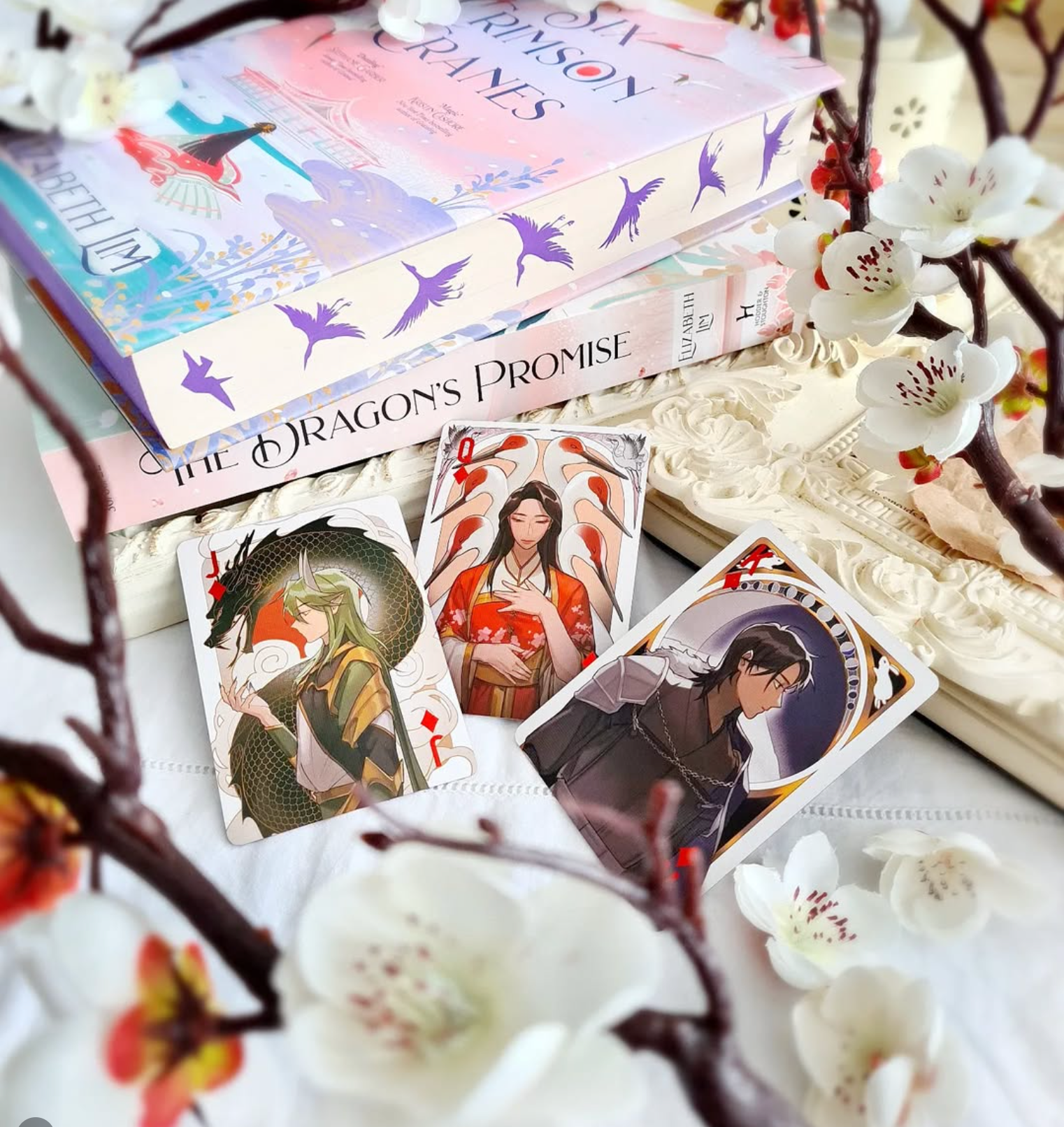 Suits of Six Crimson Crows (photo courtesy of @nelthewhichcraftsbooks on Instagram)