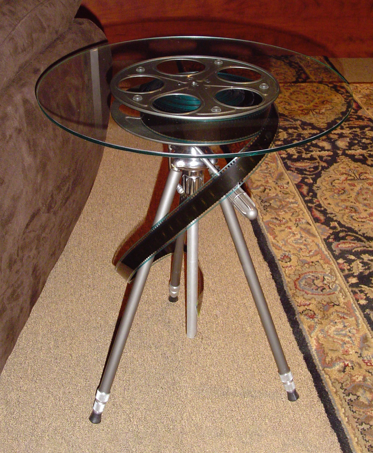 Movie reel and tripod table