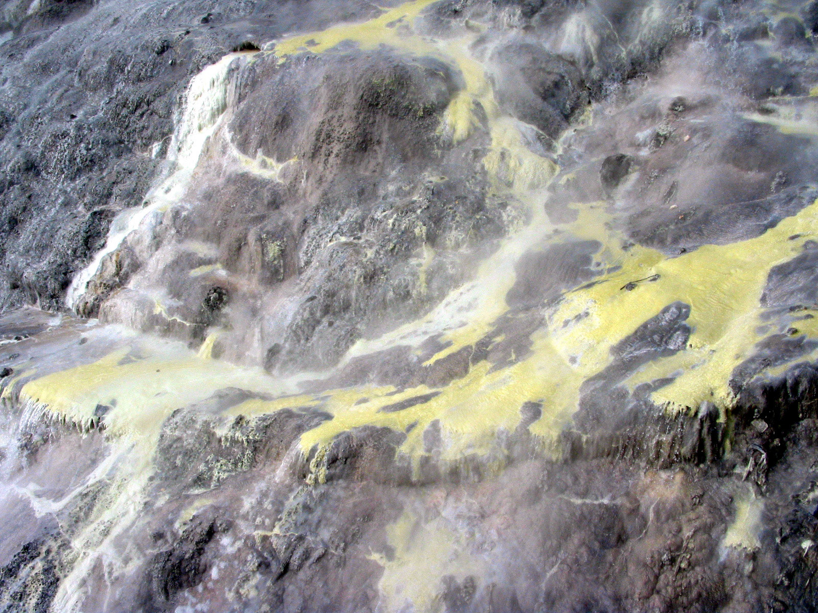 Yellow geyser gunk all over the rocks