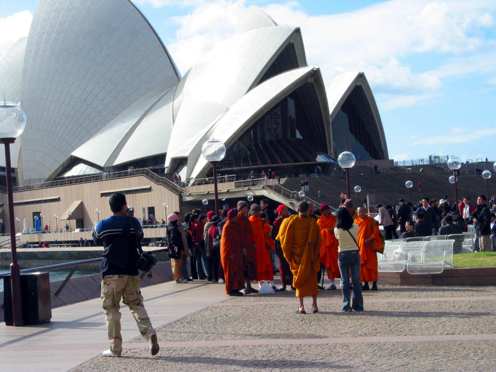 A group of monks visiting the Opera House