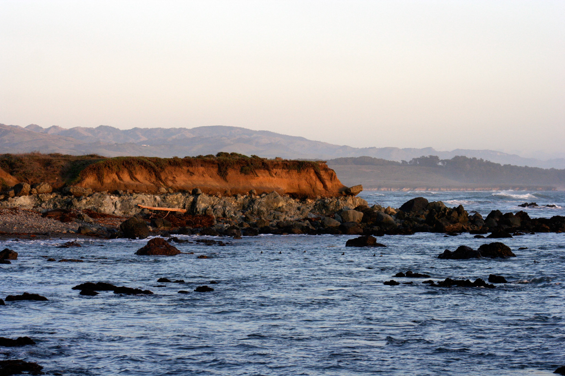 A view of the coastline as sunset hits